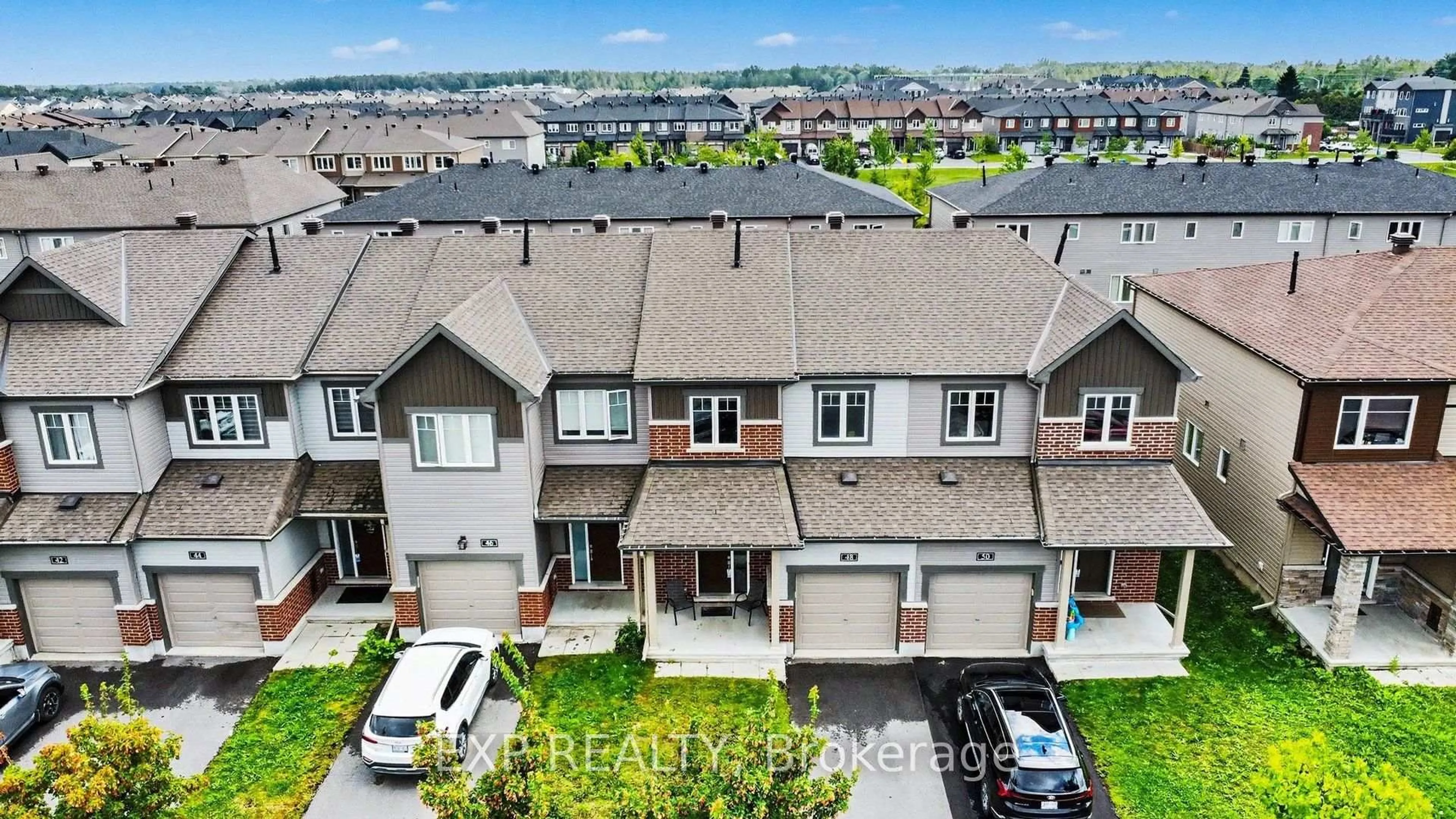 A pic from outside/outdoor area/front of a property/back of a property/a pic from drone, unknown for 48 Damselfish Walk, Ottawa Ontario K4A 2N3
