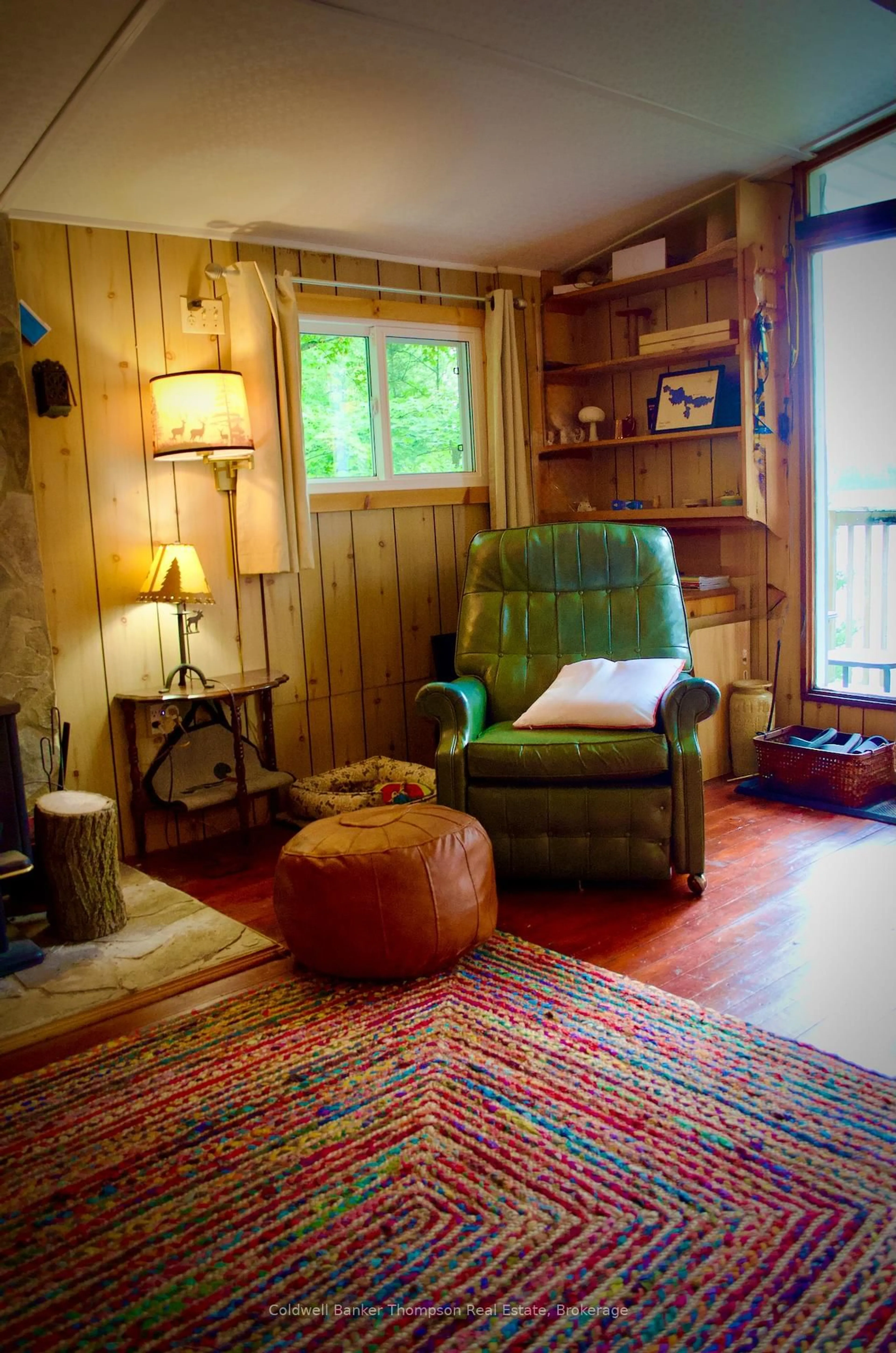 Living room with furniture, wood/laminate floor for 190 Pike Rd, Parry Sound Remote Area Ontario P0A 1X0