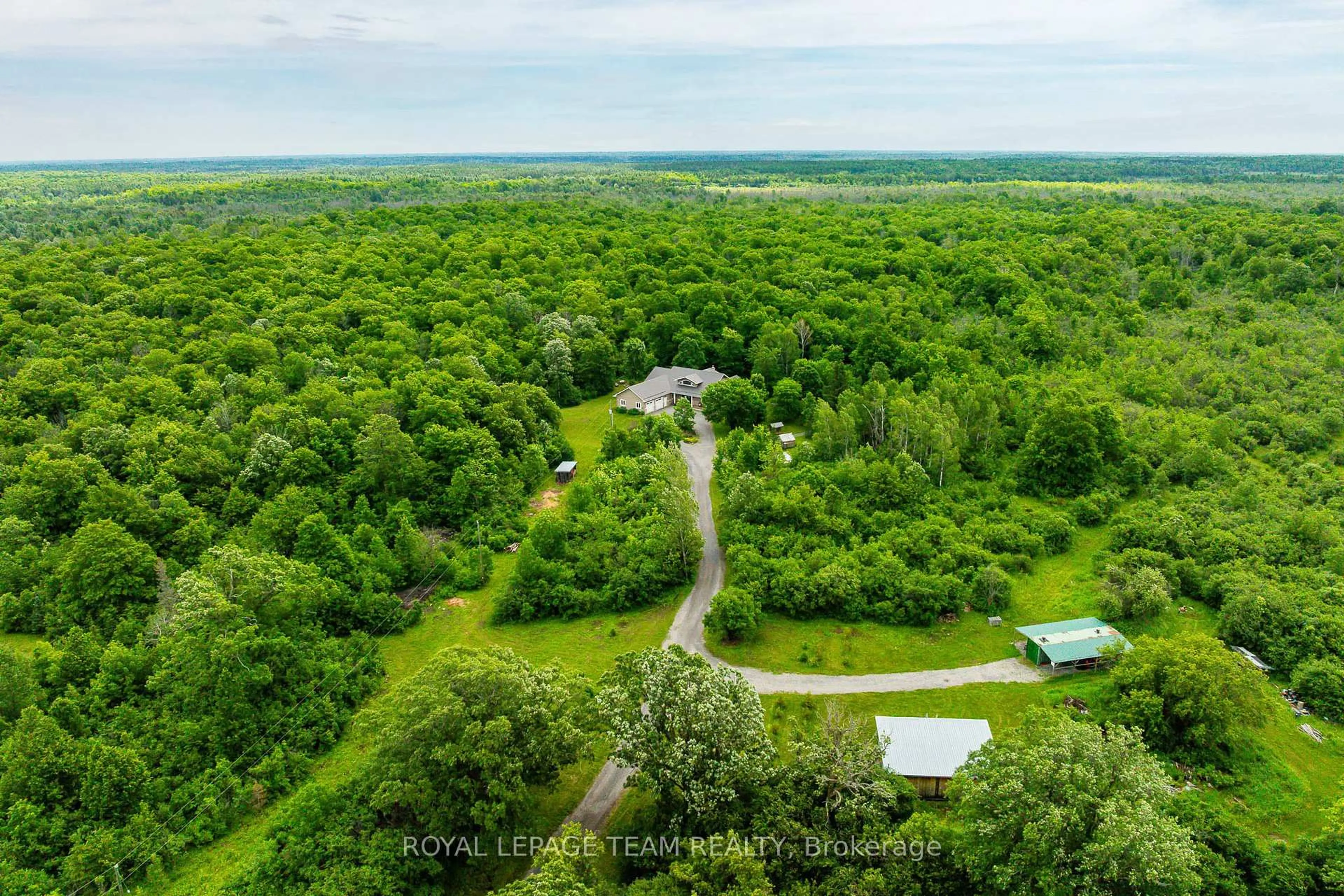 A pic from outside/outdoor area/front of a property/back of a property/a pic from drone, forest/trees view for 1142 County Road 43 Rd, Merrickville-Wolford Ontario K0G 1N0
