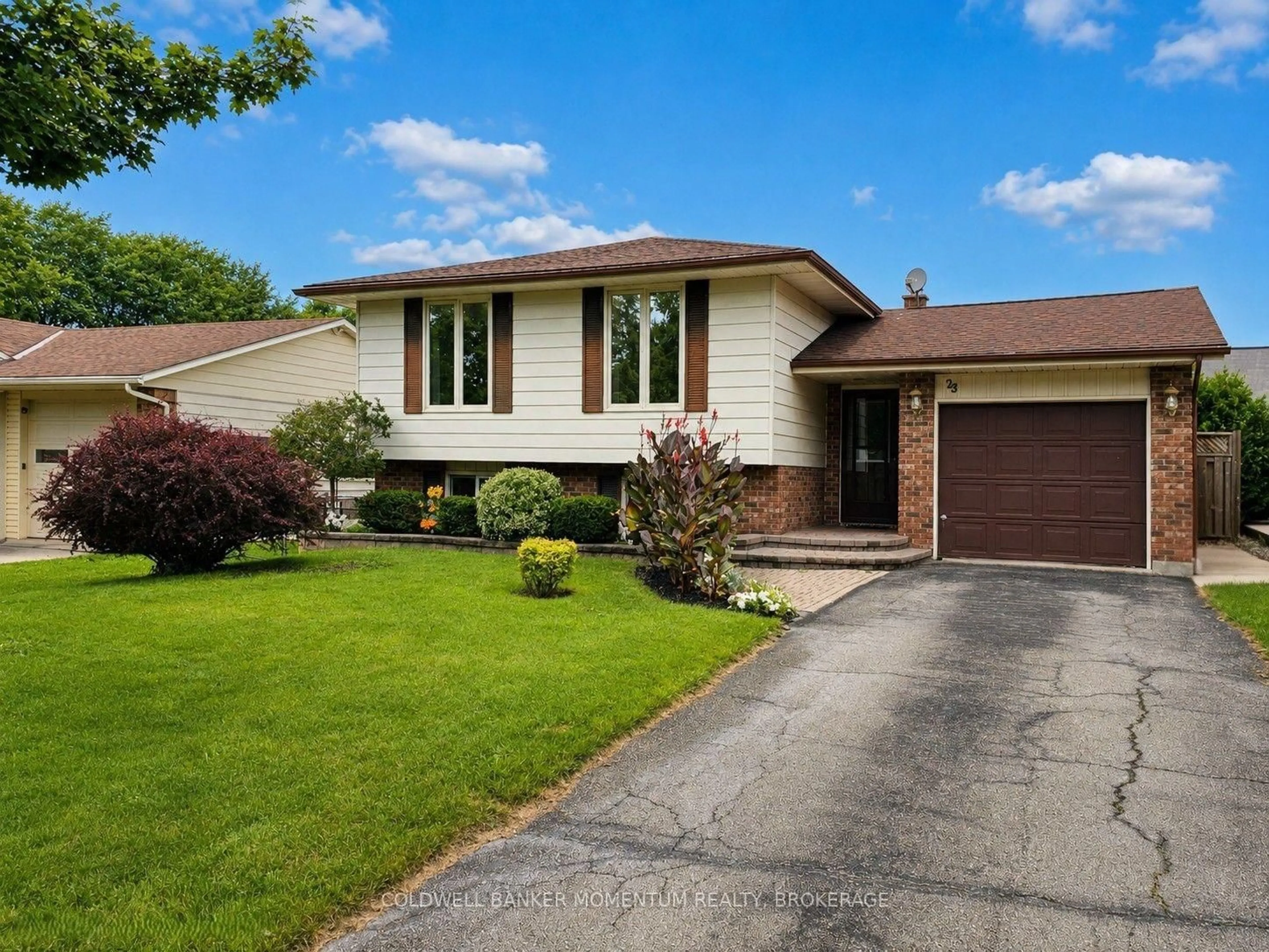 Home with brick exterior material, street for 23 Churchill Circ, Norfolk Ontario N3Y 4Z4