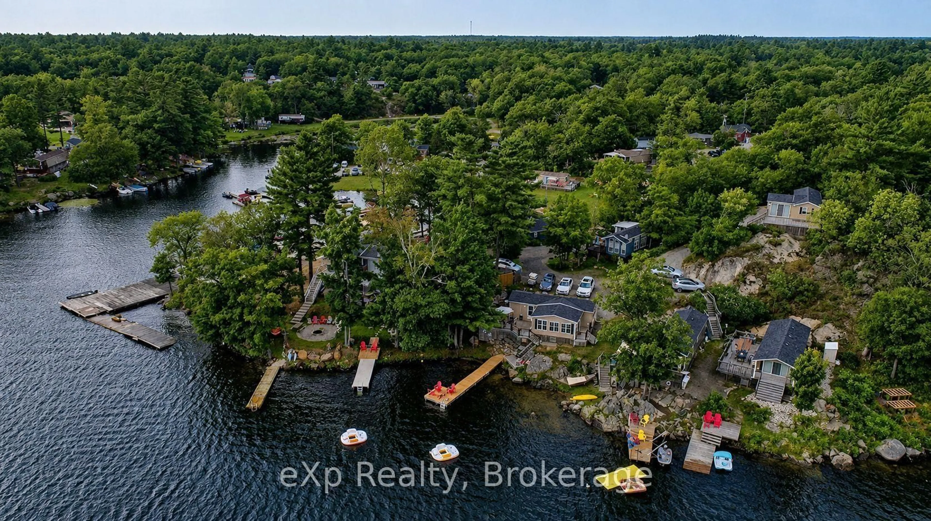 A pic from outside/outdoor area/front of a property/back of a property/a pic from drone, water/lake/river/ocean view for 1336 Morrison Lake Rd #Riverside 36, Gravenhurst Ontario P0E 1G0