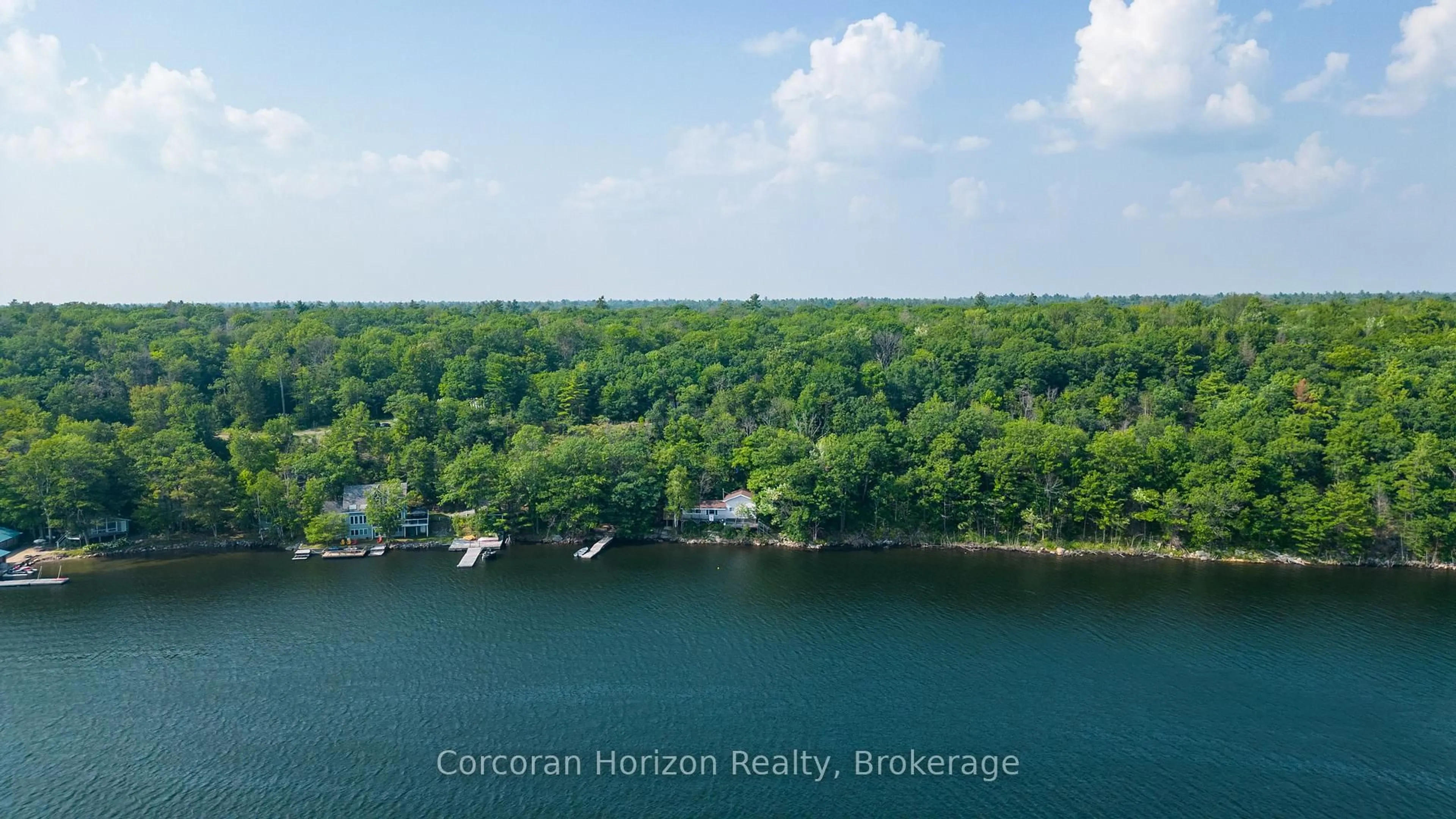 A pic from outside/outdoor area/front of a property/back of a property/a pic from drone, water/lake/river/ocean view for 959 HARRISON Tr, Georgian Bay Ontario P0C 1H0
