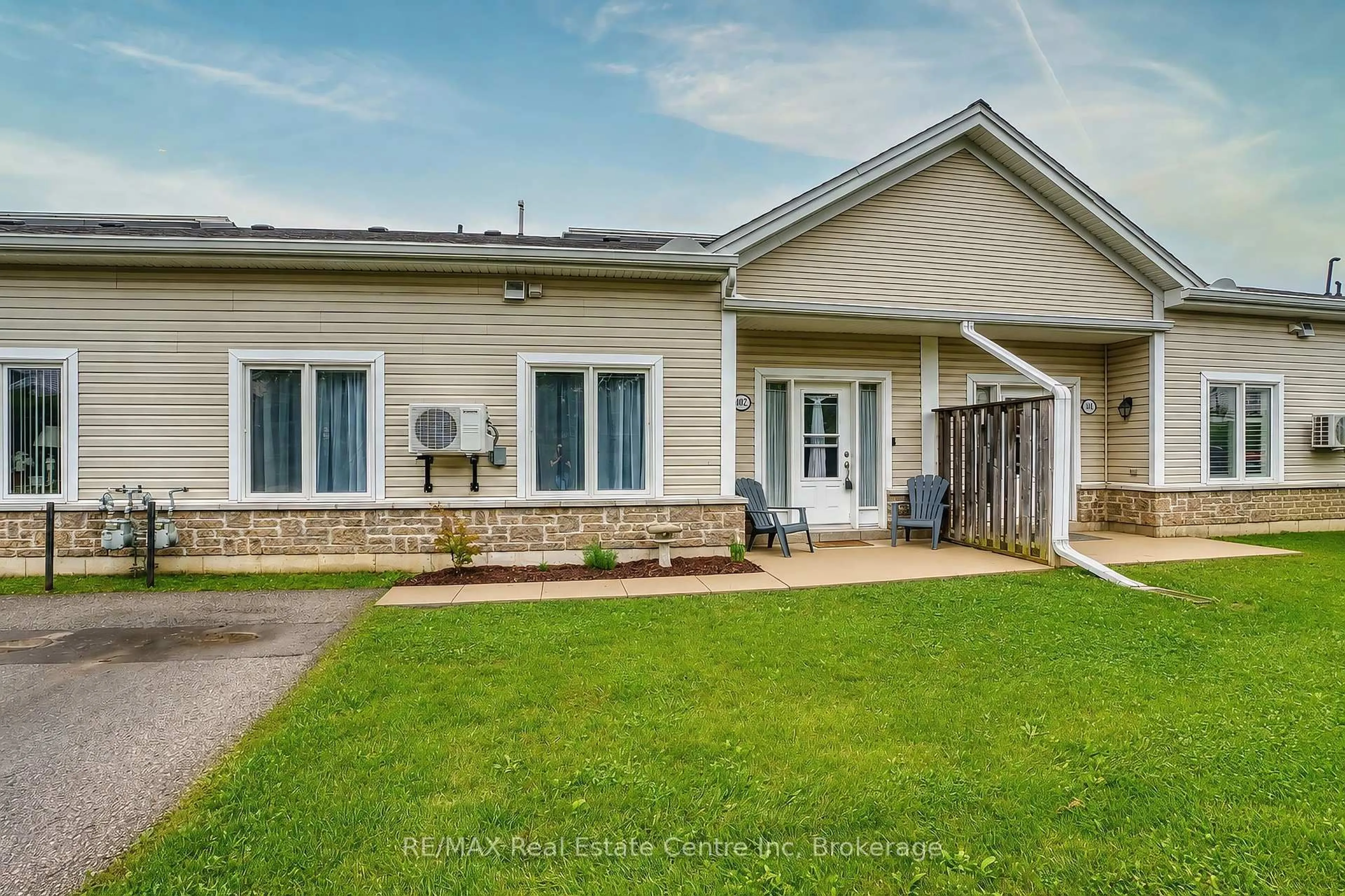 Home with vinyl exterior material, street for 760 Woodhill Dr #102, Centre Wellington Ontario N1M 3W5