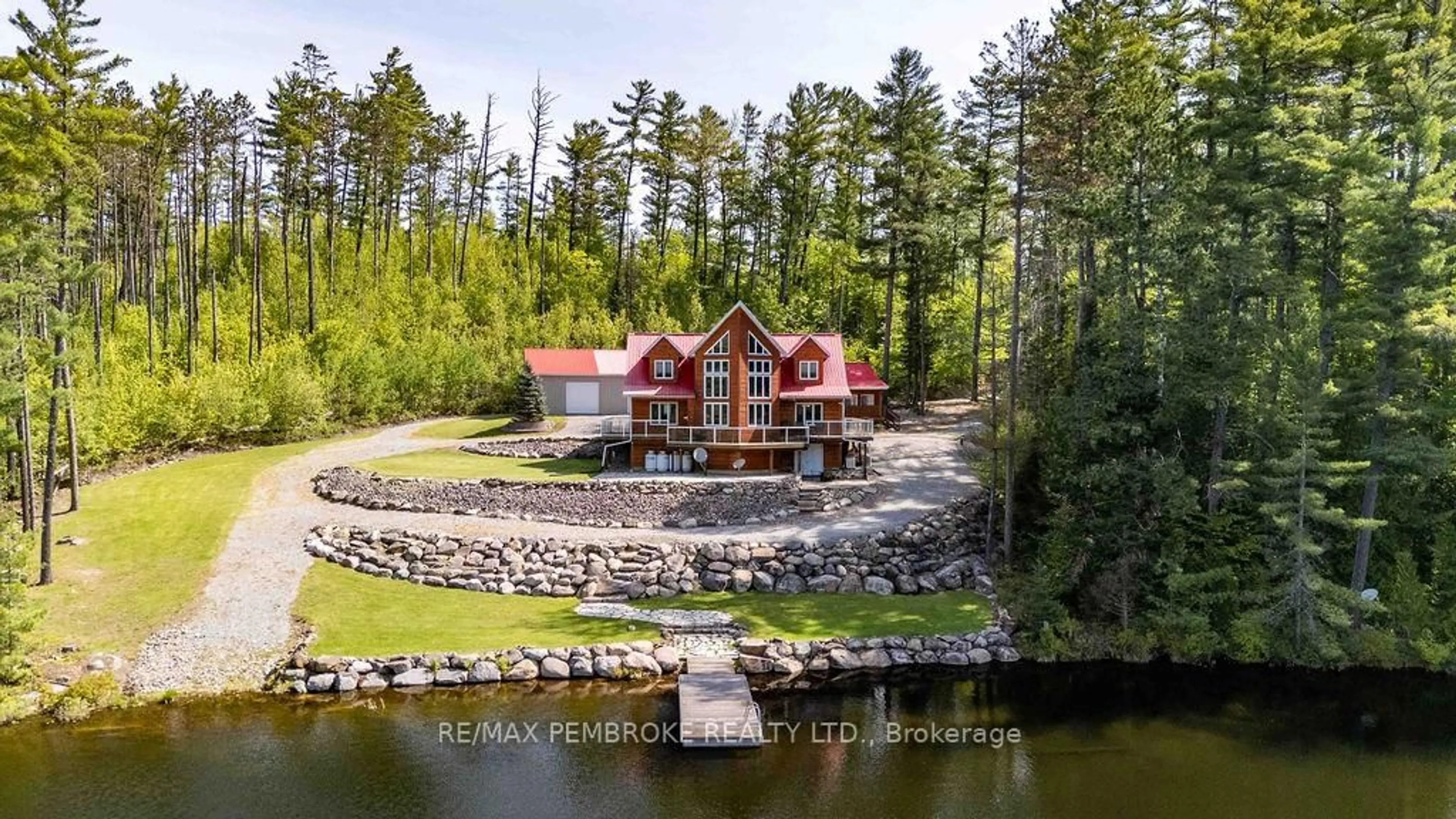 A pic from outside/outdoor area/front of a property/back of a property/a pic from drone, water/lake/river/ocean view for 208 Red Fox Tr, Stonecliffe Ontario K0J 2K0