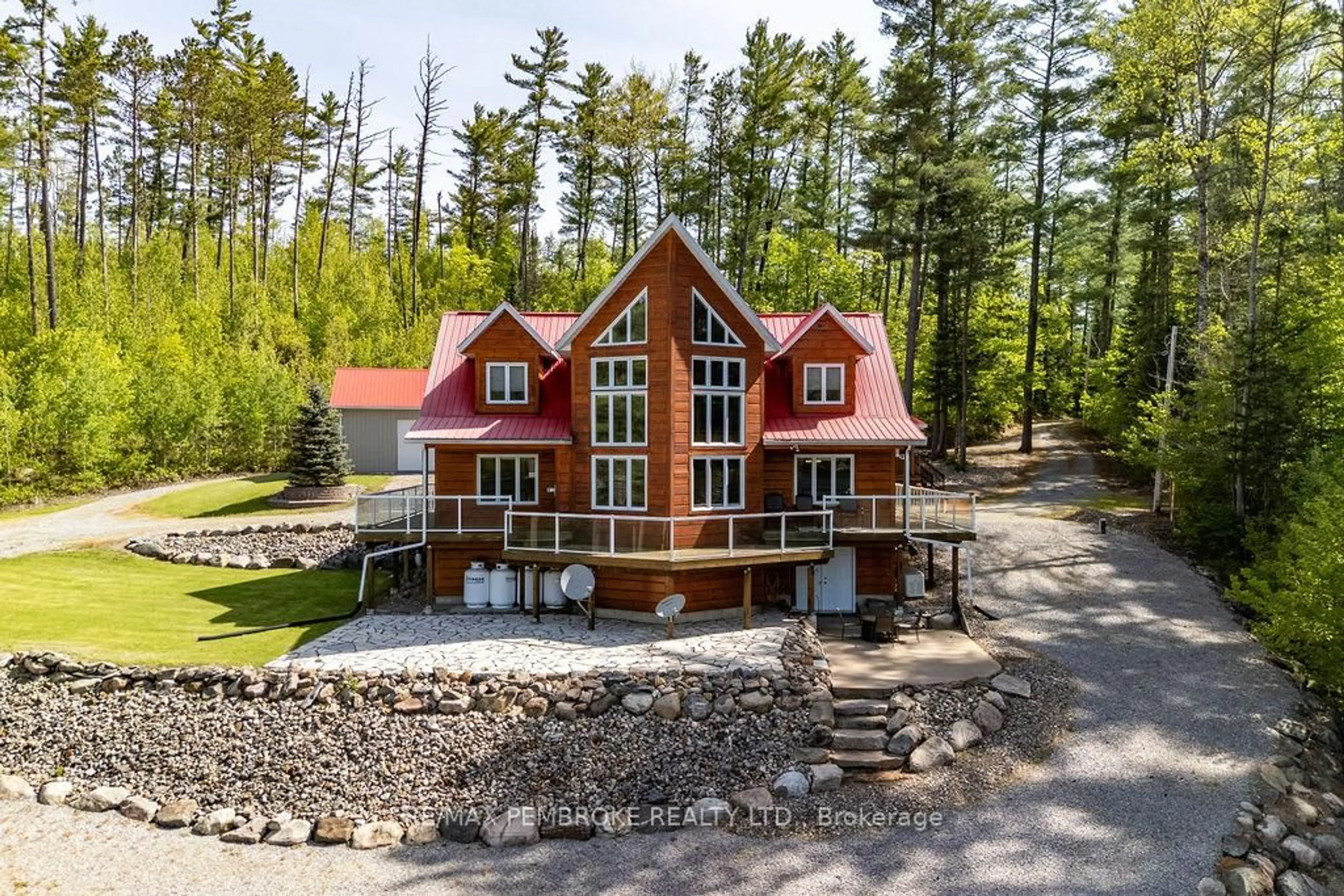 A pic from outside/outdoor area/front of a property/back of a property/a pic from drone, unknown for 208 Red Fox Tr, Stonecliffe Ontario K0J 2K0