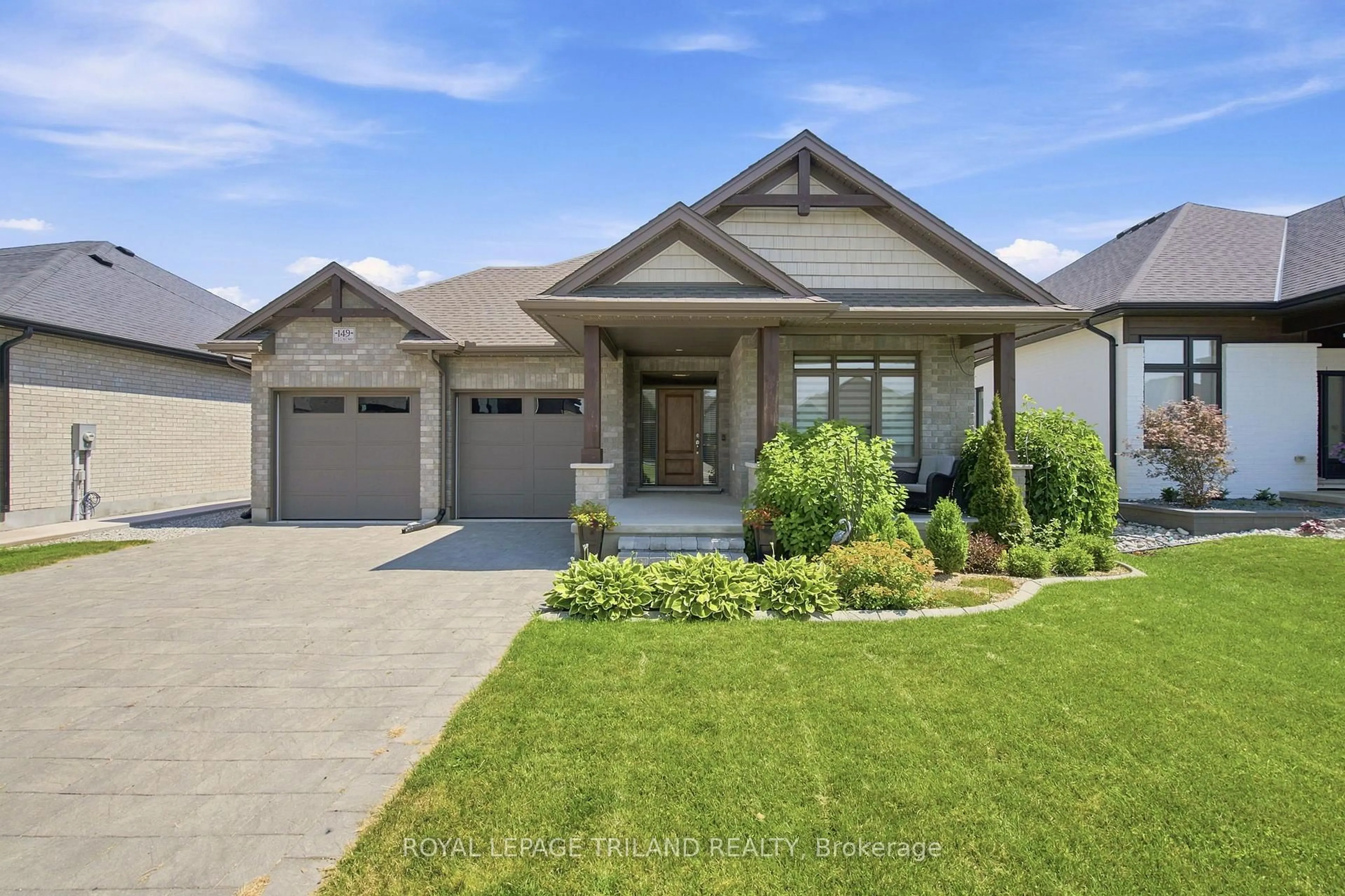 Home with brick exterior material, street for 149 Collins Way, Strathroy-Caradoc Ontario N7G 0G2