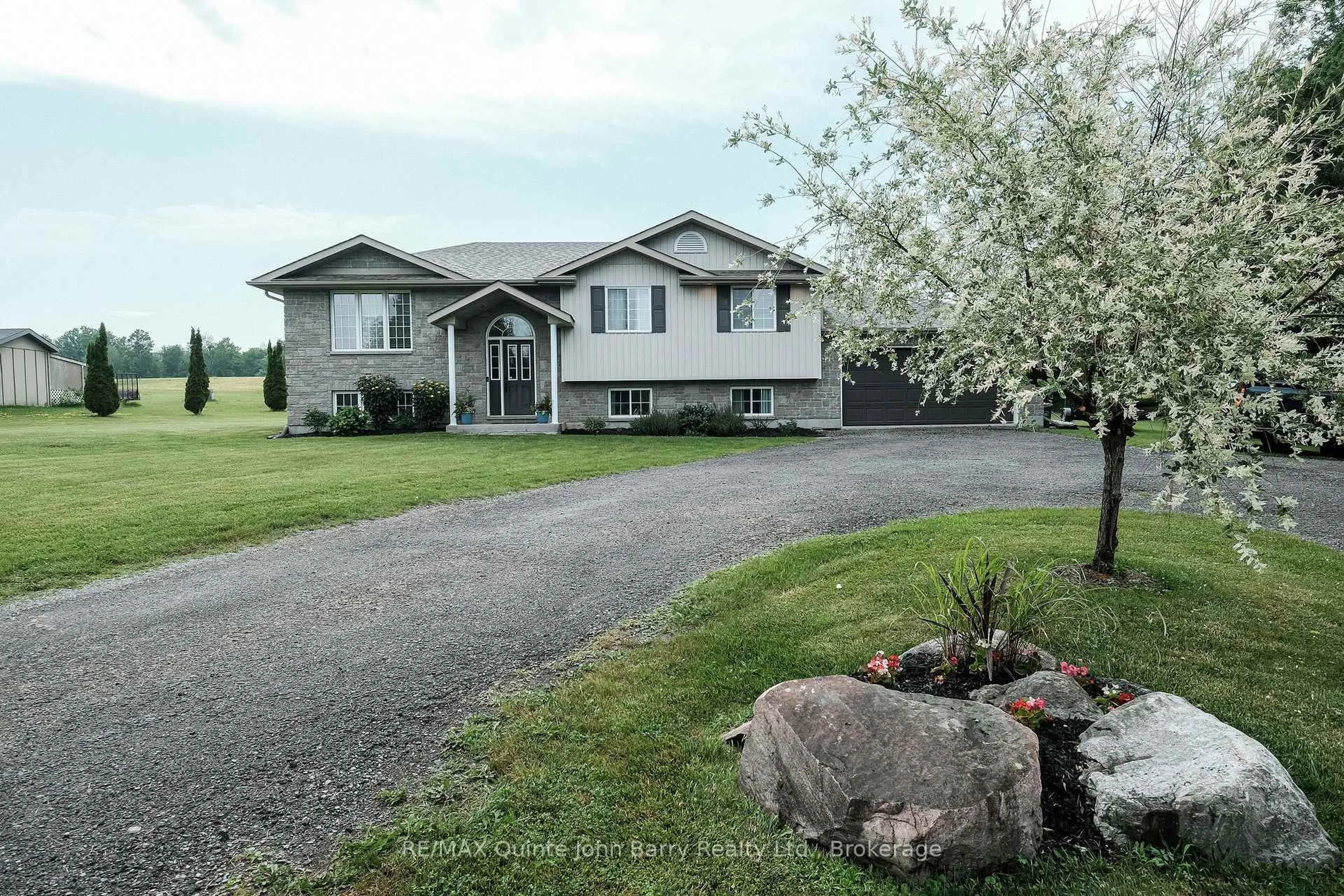 A pic from outside/outdoor area/front of a property/back of a property/a pic from drone, street for 16566 Highway 2, Trenton Ontario K8V 5P7