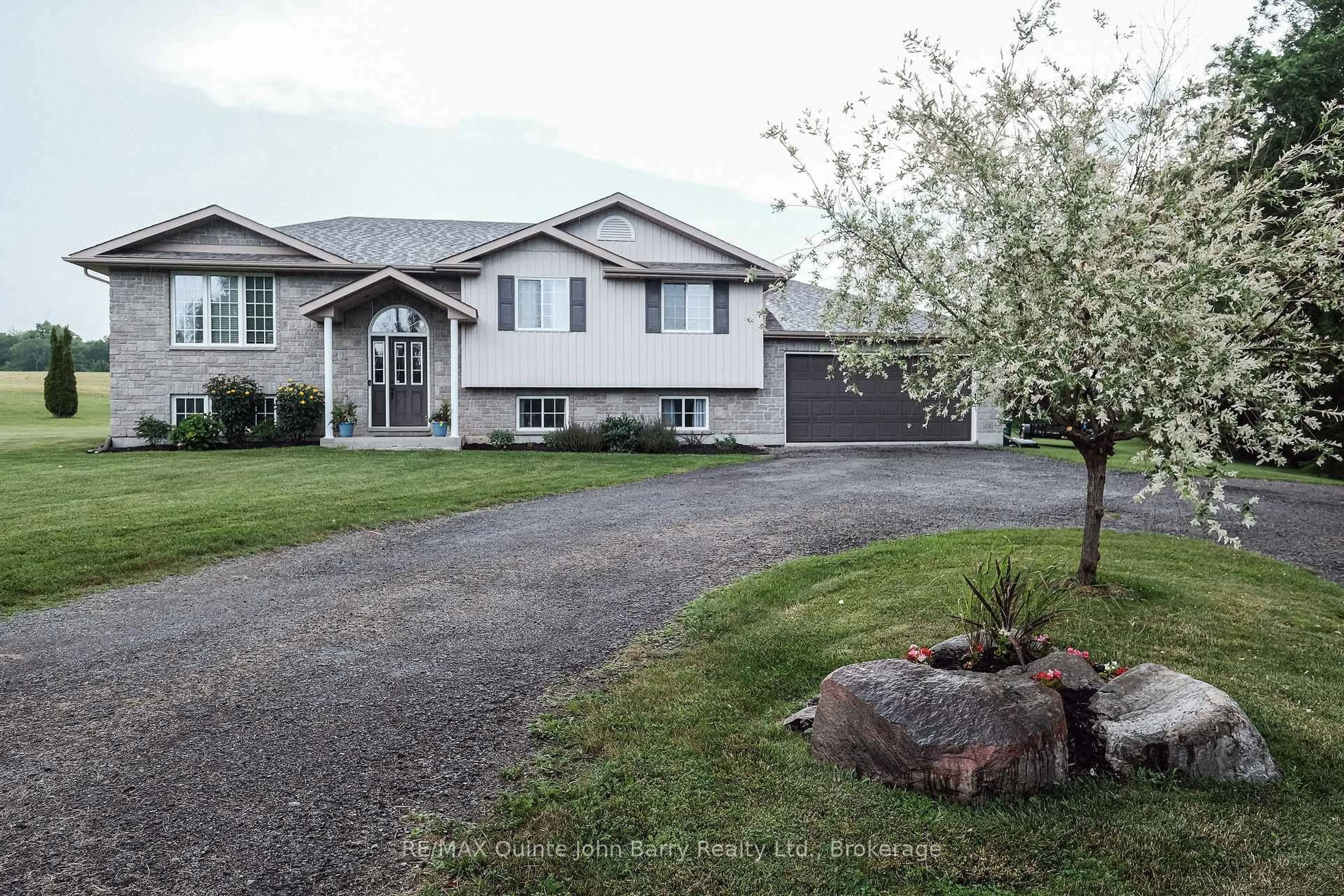 A pic from outside/outdoor area/front of a property/back of a property/a pic from drone, street for 16566 Highway 2, Trenton Ontario K8V 5P7