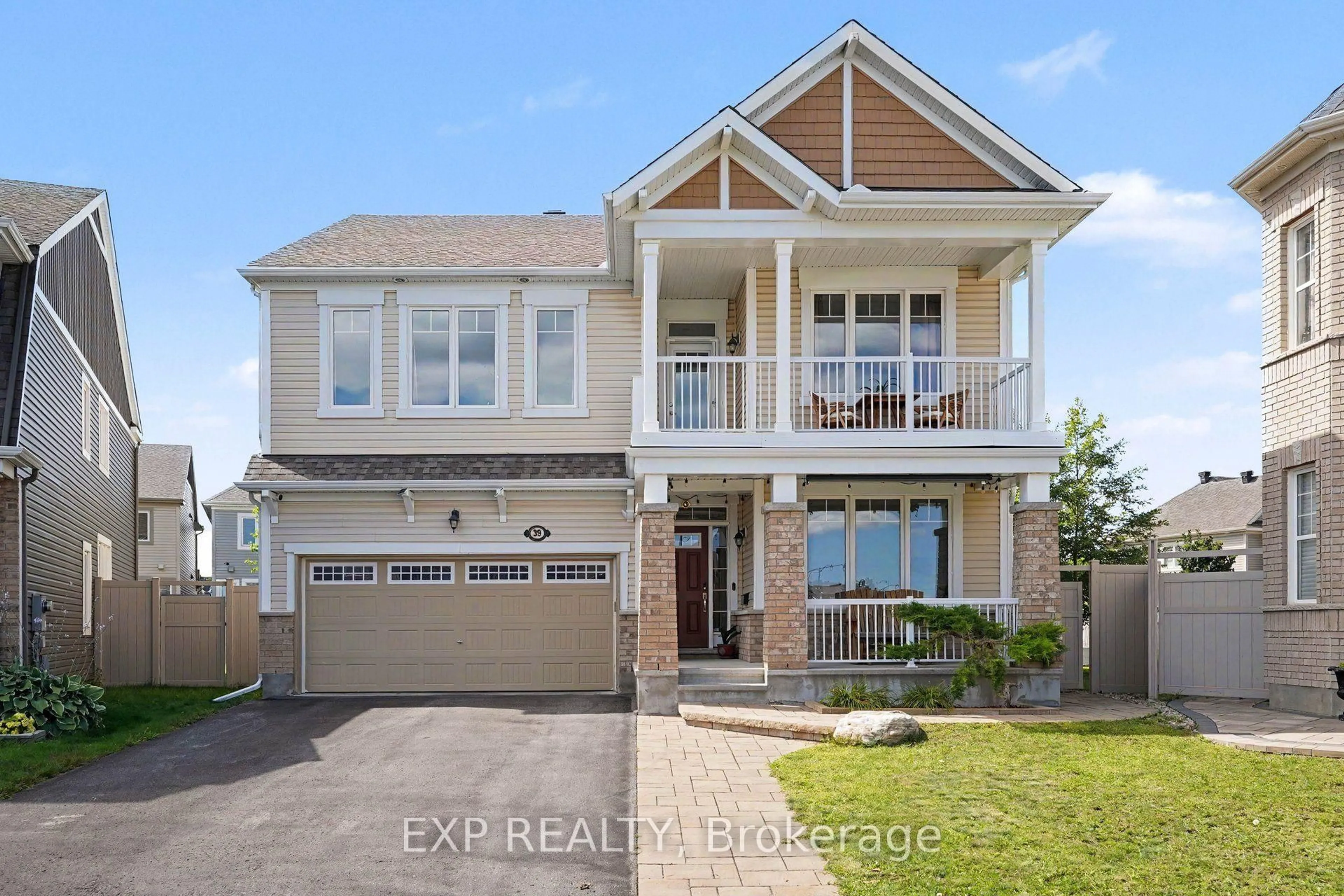 Home with brick exterior material, street for 39 Pondhawk Way, Ottawa Ontario K2J 5Z2
