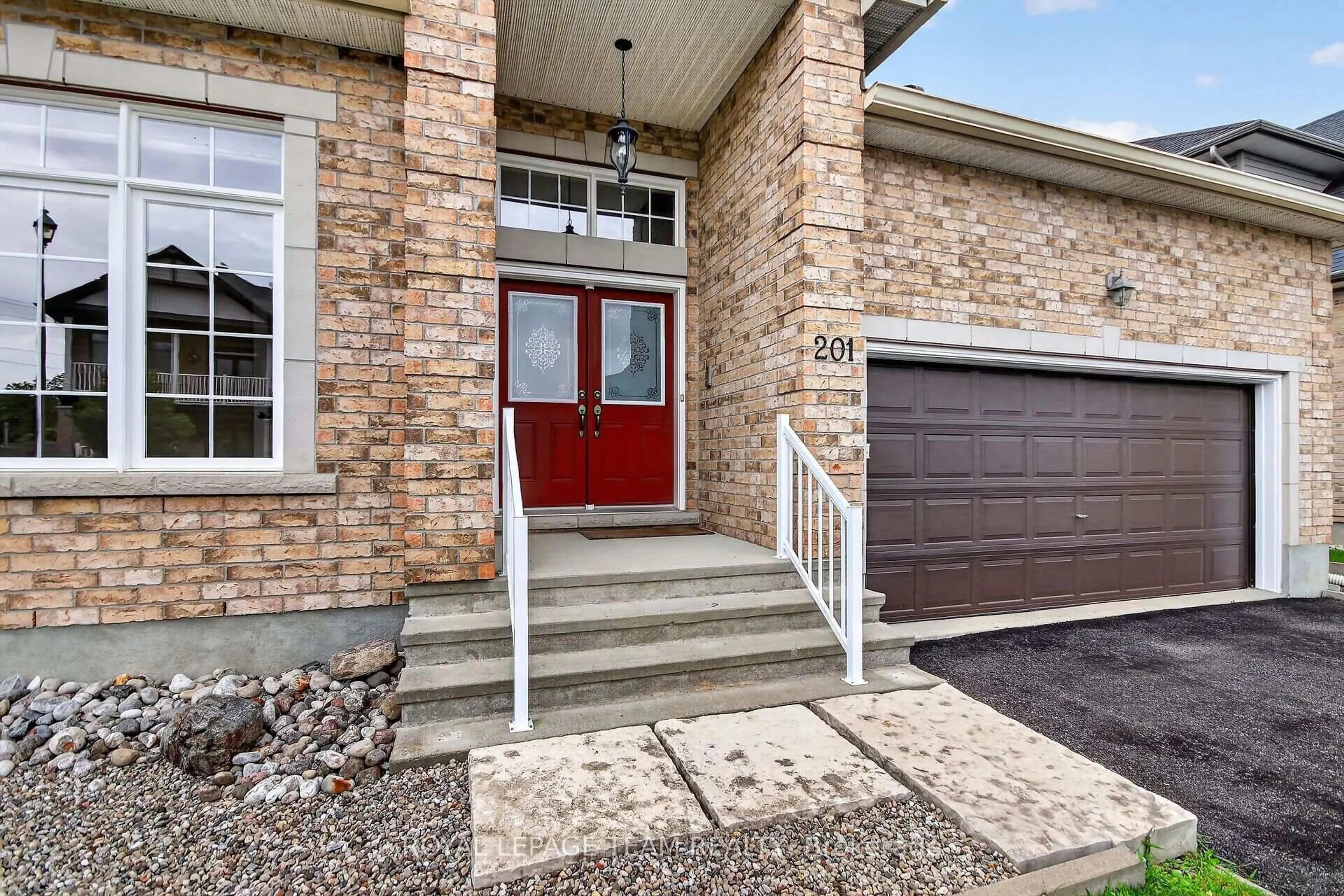 Home with brick exterior material, street for 201 Trailgate St, Ottawa Ontario K1V 0Z9