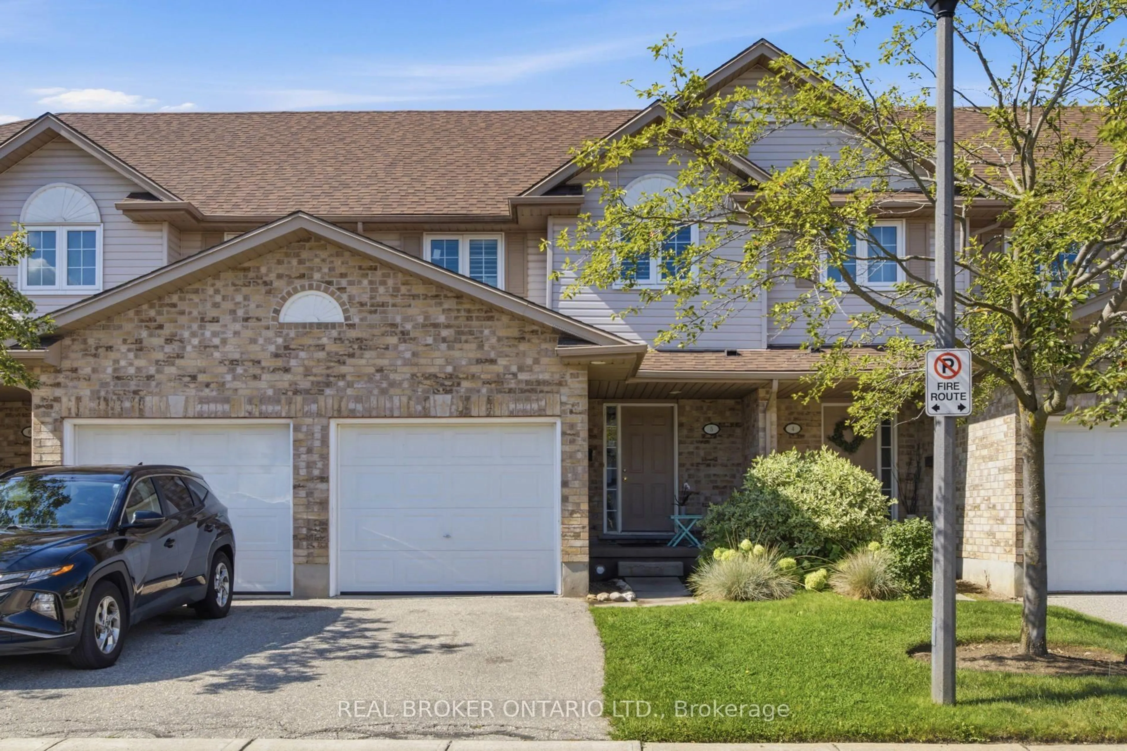 Home with brick exterior material, street for 31 Schroder Cres #5, Guelph Ontario N1E 7M6