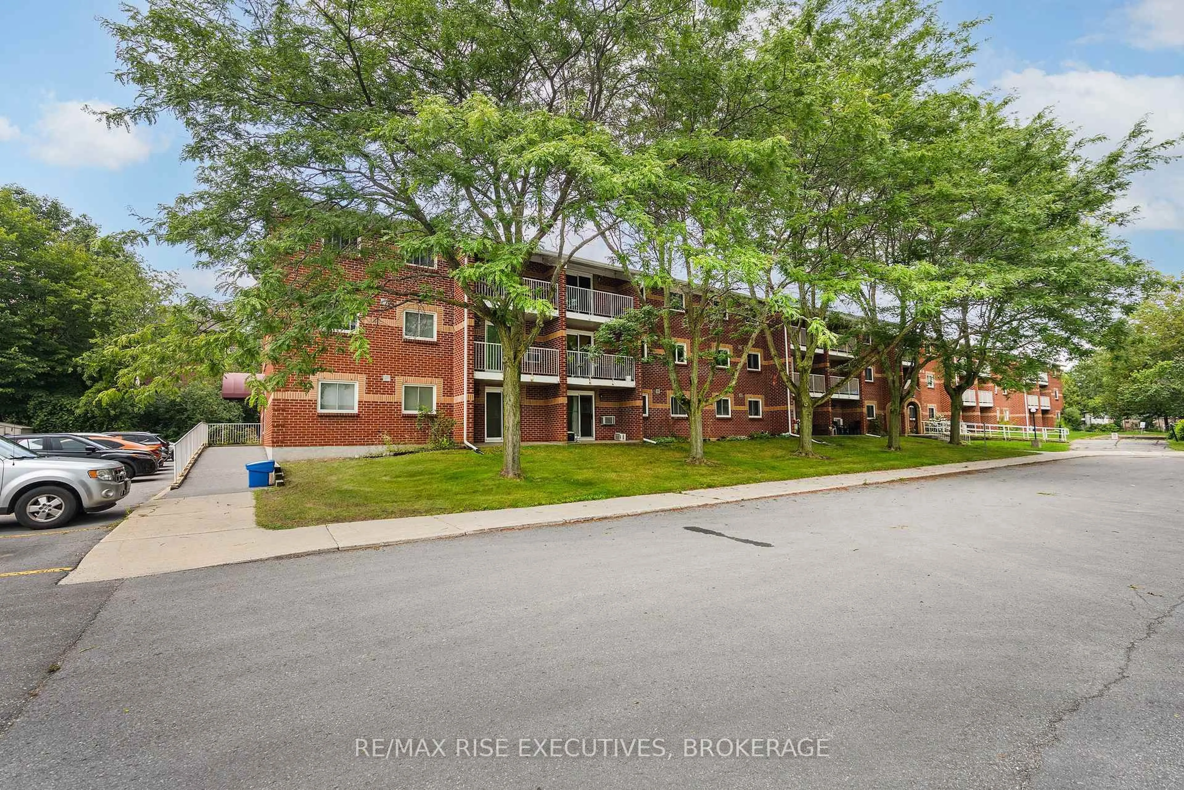 A pic from outside/outdoor area/front of a property/back of a property/a pic from drone, street for 561 Armstrong Rd #305, Kingston Ontario K7M 8J9