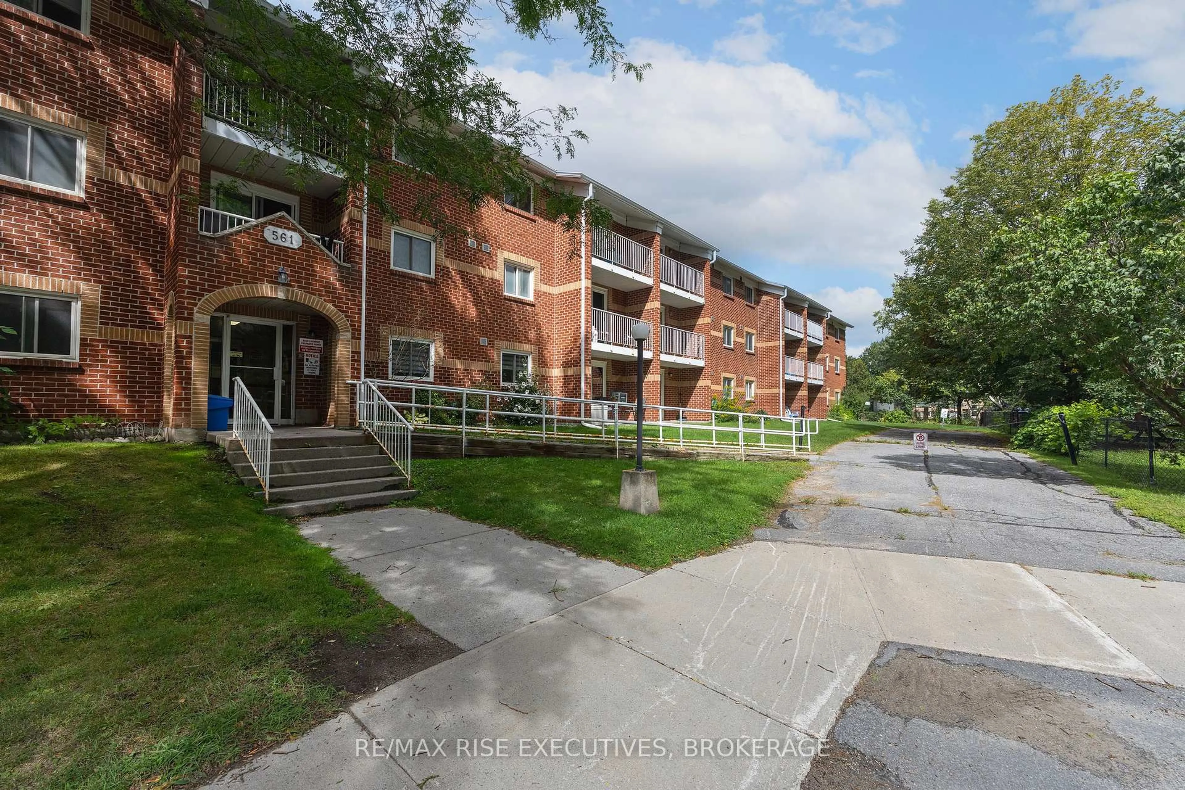A pic from outside/outdoor area/front of a property/back of a property/a pic from drone, street for 561 Armstrong Rd #305, Kingston Ontario K7M 8J9