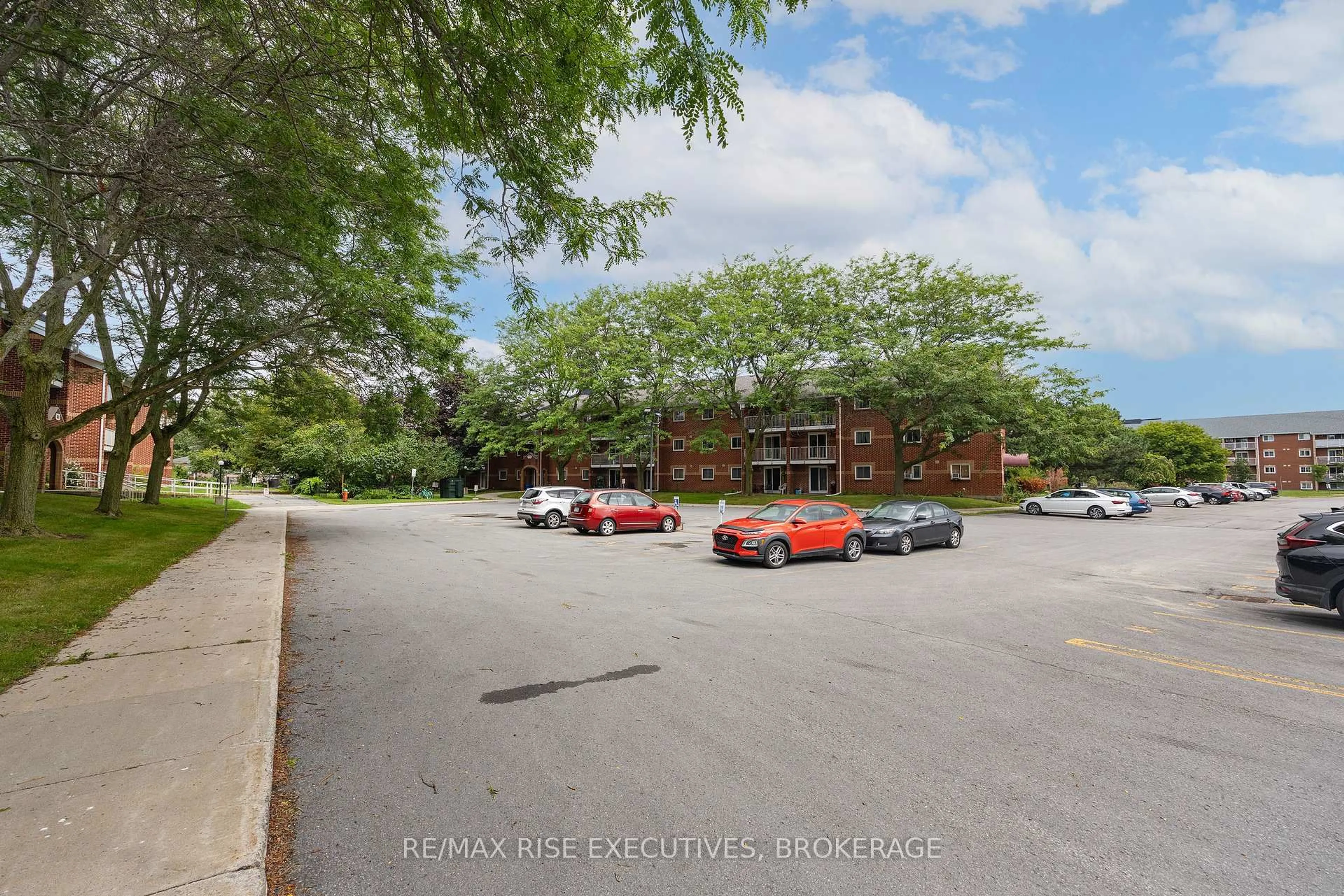 A pic from outside/outdoor area/front of a property/back of a property/a pic from drone, unknown for 561 Armstrong Rd #305, Kingston Ontario K7M 8J9