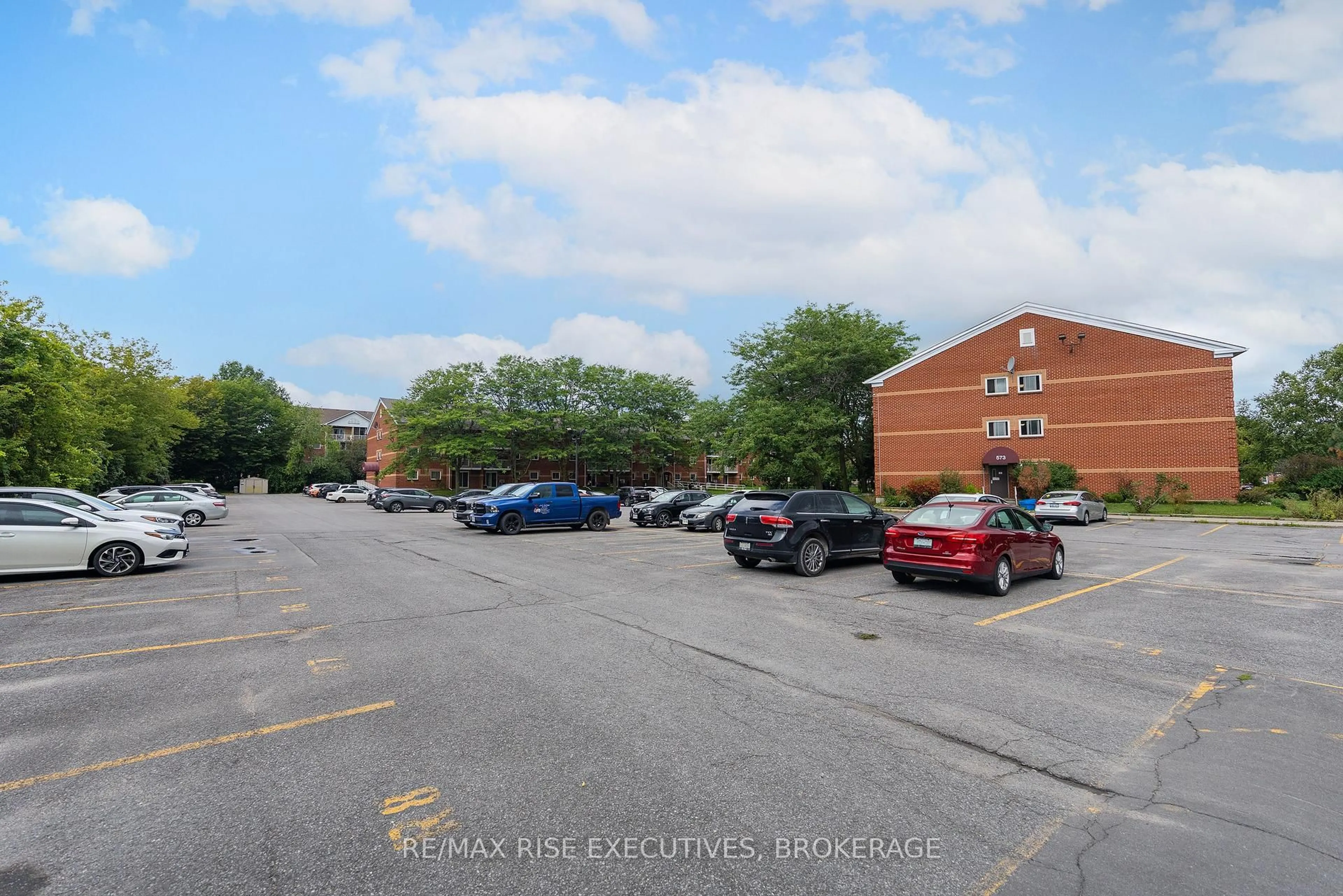 A pic from outside/outdoor area/front of a property/back of a property/a pic from drone, street for 561 Armstrong Rd #305, Kingston Ontario K7M 8J9