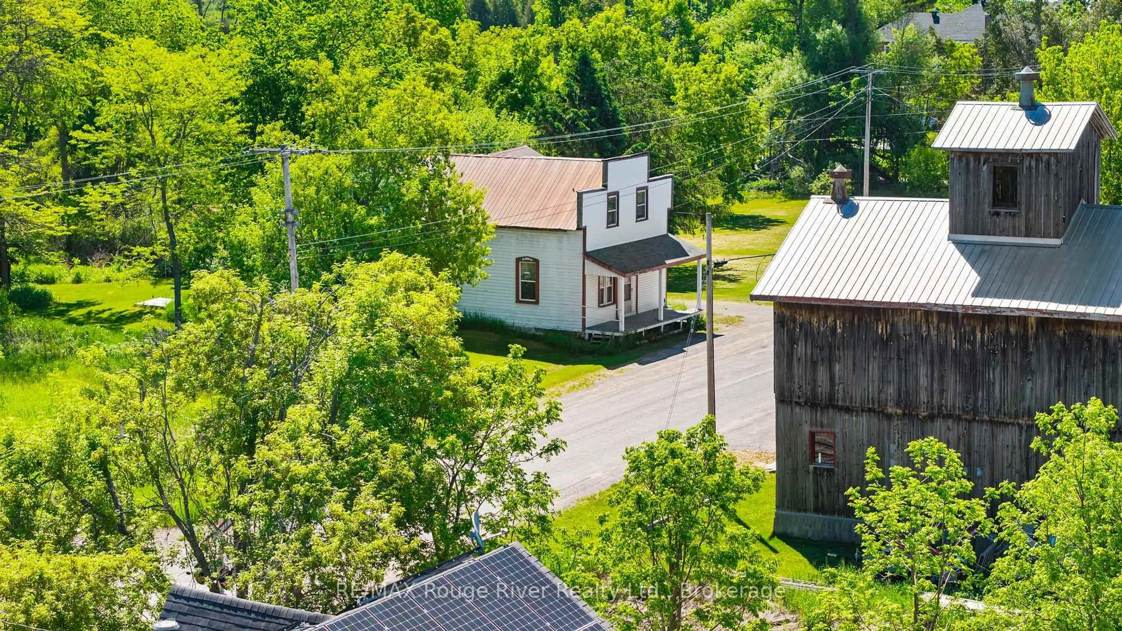 A pic from outside/outdoor area/front of a property/back of a property/a pic from drone, street for 2407 Indian River Line, Otonabee-South Monaghan Ontario K0L 2B0