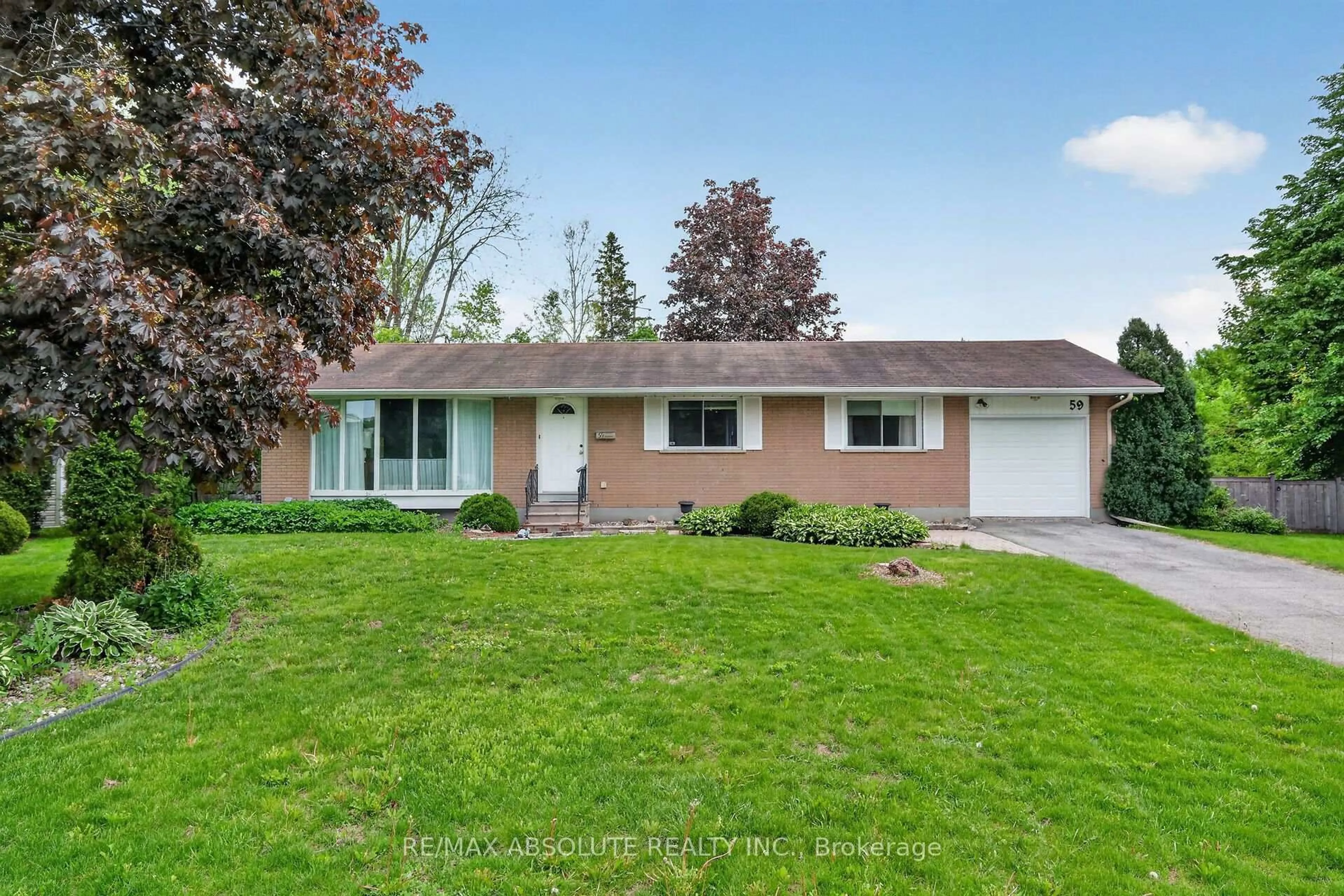 Home with vinyl exterior material, street for 59 Evergreen Dr, Ottawa Ontario K2H 6C5
