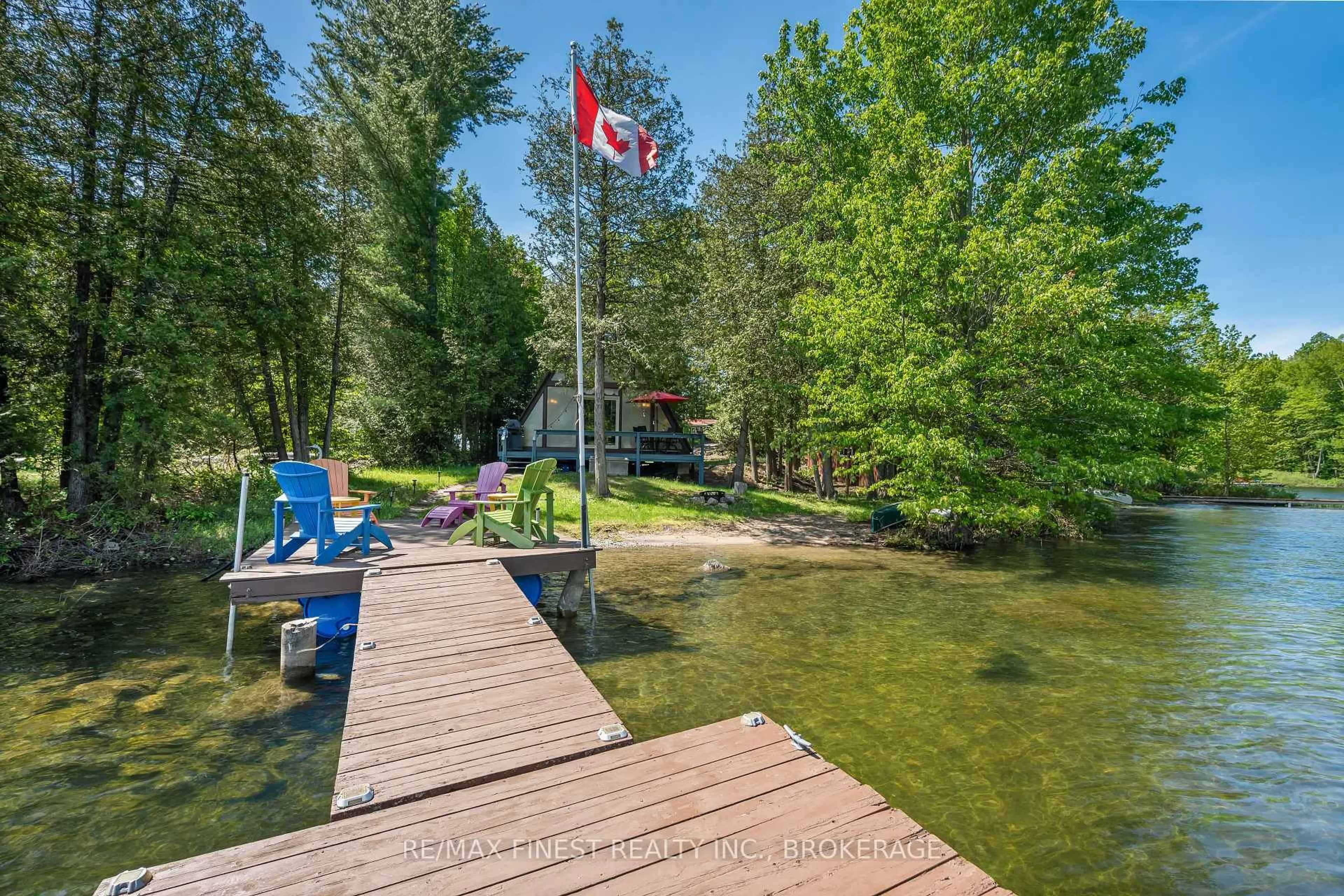 A pic from outside/outdoor area/front of a property/back of a property/a pic from drone, water/lake/river/ocean view for 53 Hillside Lane, Verona Ontario K0H 2W0