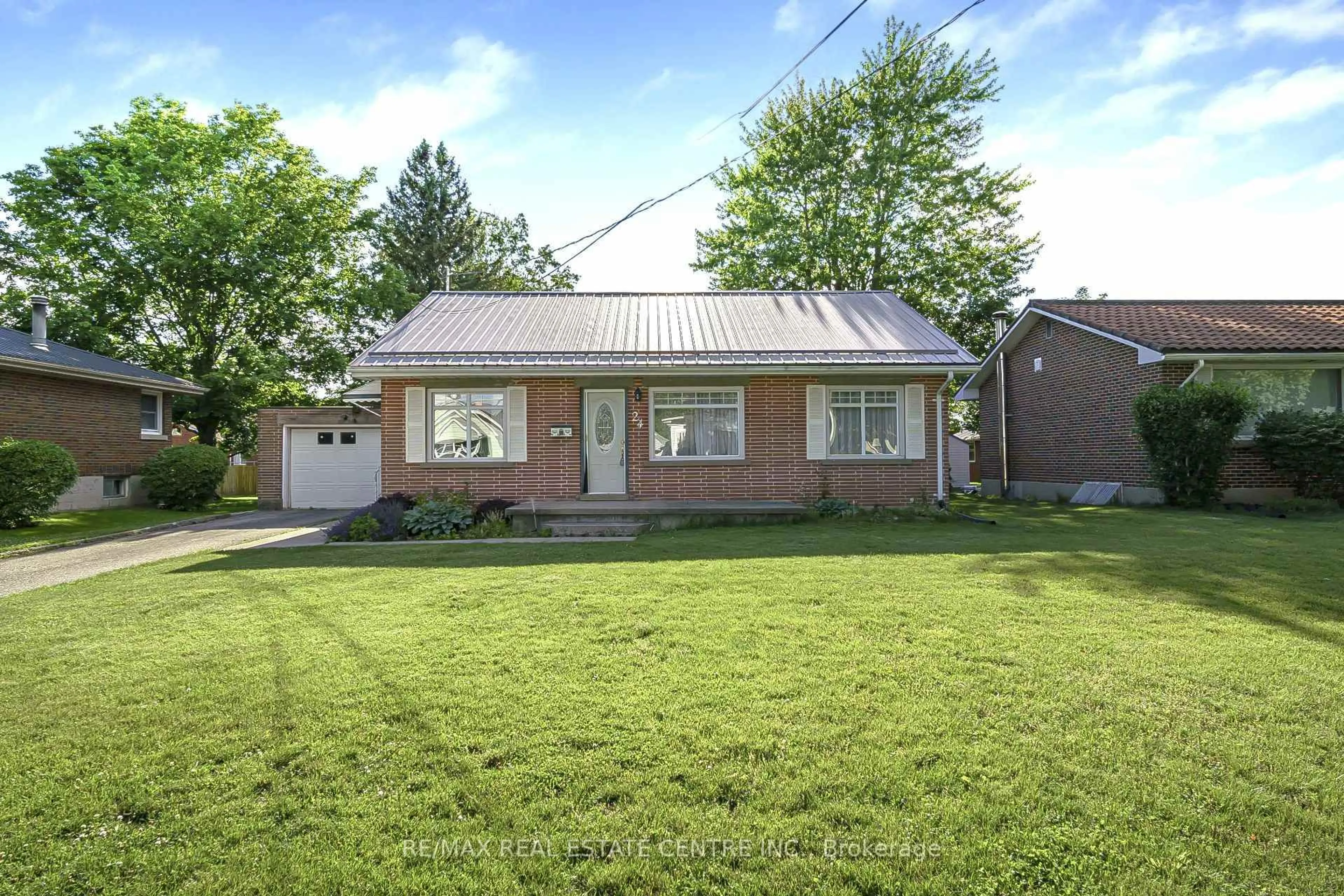 Home with brick exterior material, street for 24 Park St, Aylmer Ontario N5H 2P3