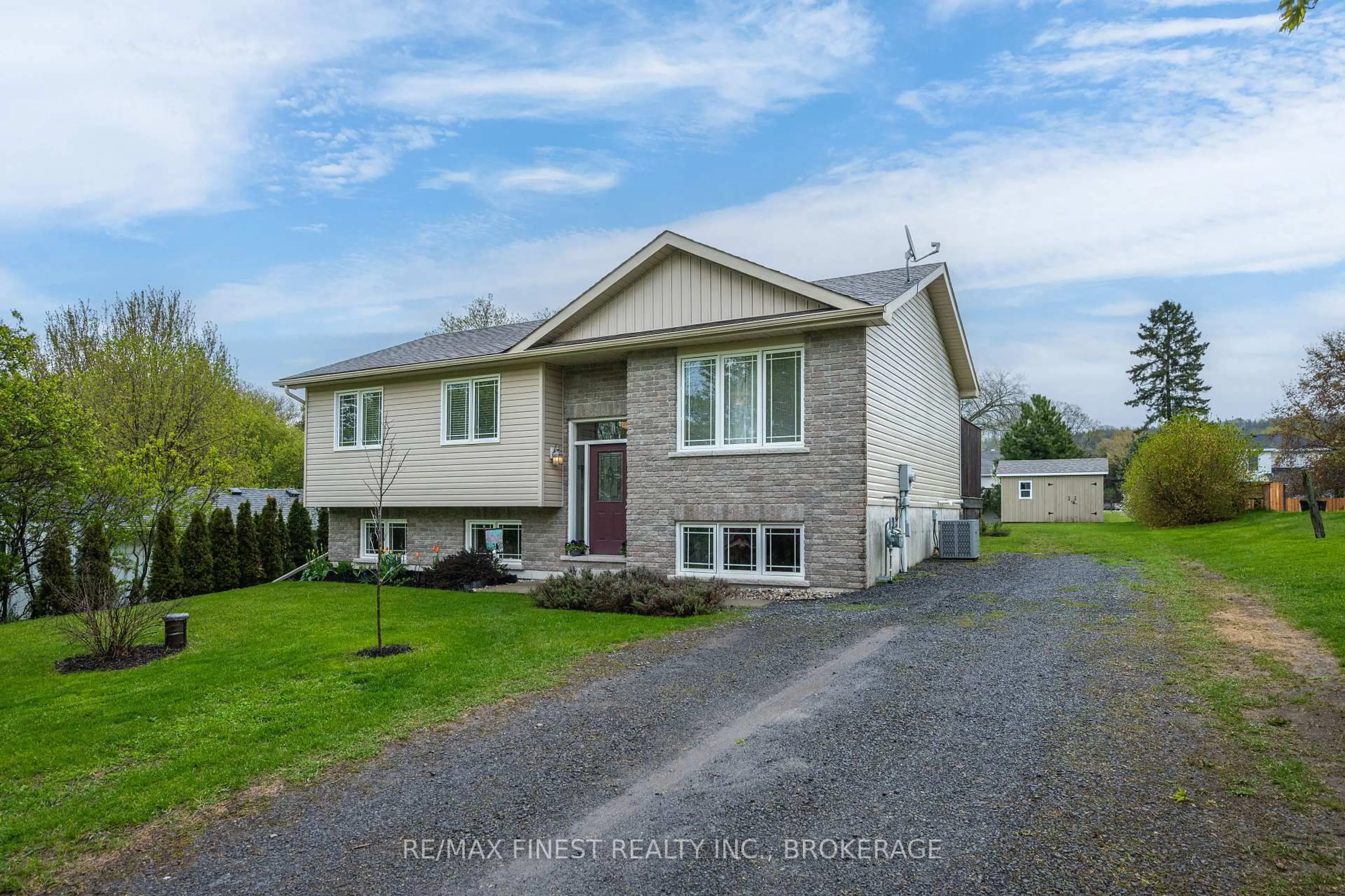 A pic from outside/outdoor area/front of a property/back of a property/a pic from drone, street for 145 Upper Lake St, Prince Edward County Ontario K0K 2T0