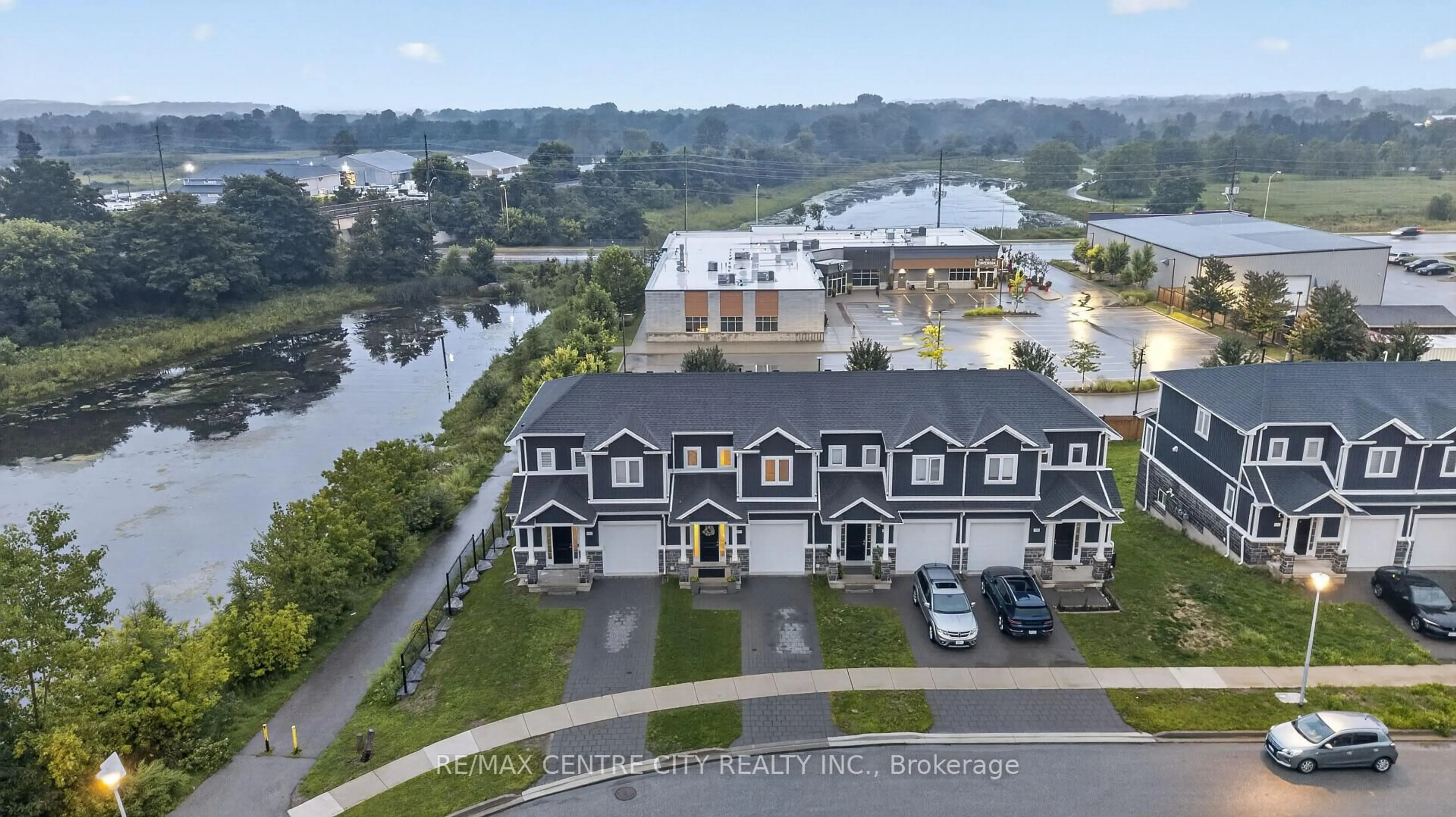 A pic from outside/outdoor area/front of a property/back of a property/a pic from drone, water/lake/river/ocean view for 1740 Finley Cres, London North Ontario N6G 0W3