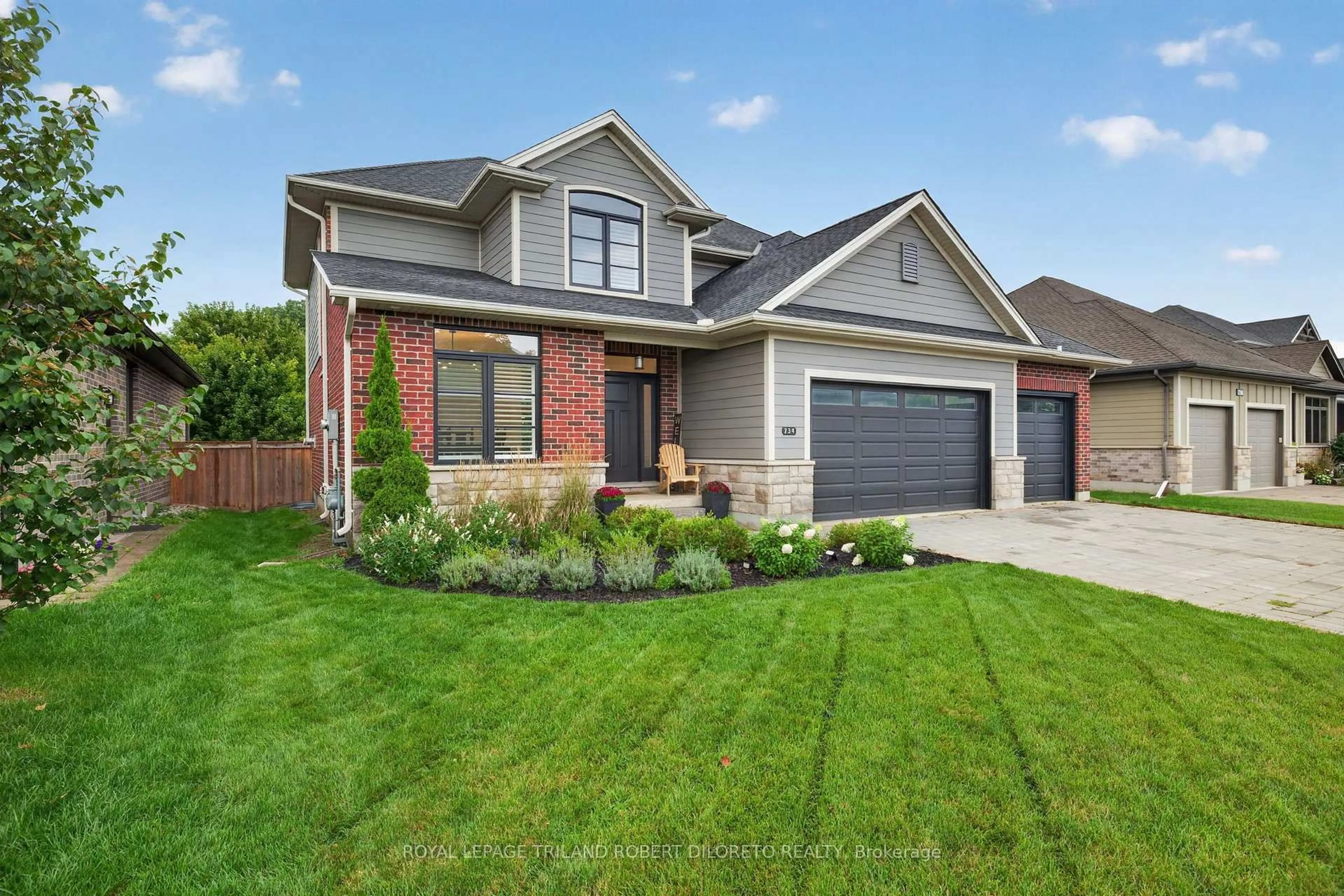 Home with brick exterior material, street for 734 Radisson Lane, Strathroy-Caradoc Ontario N0L 1W0