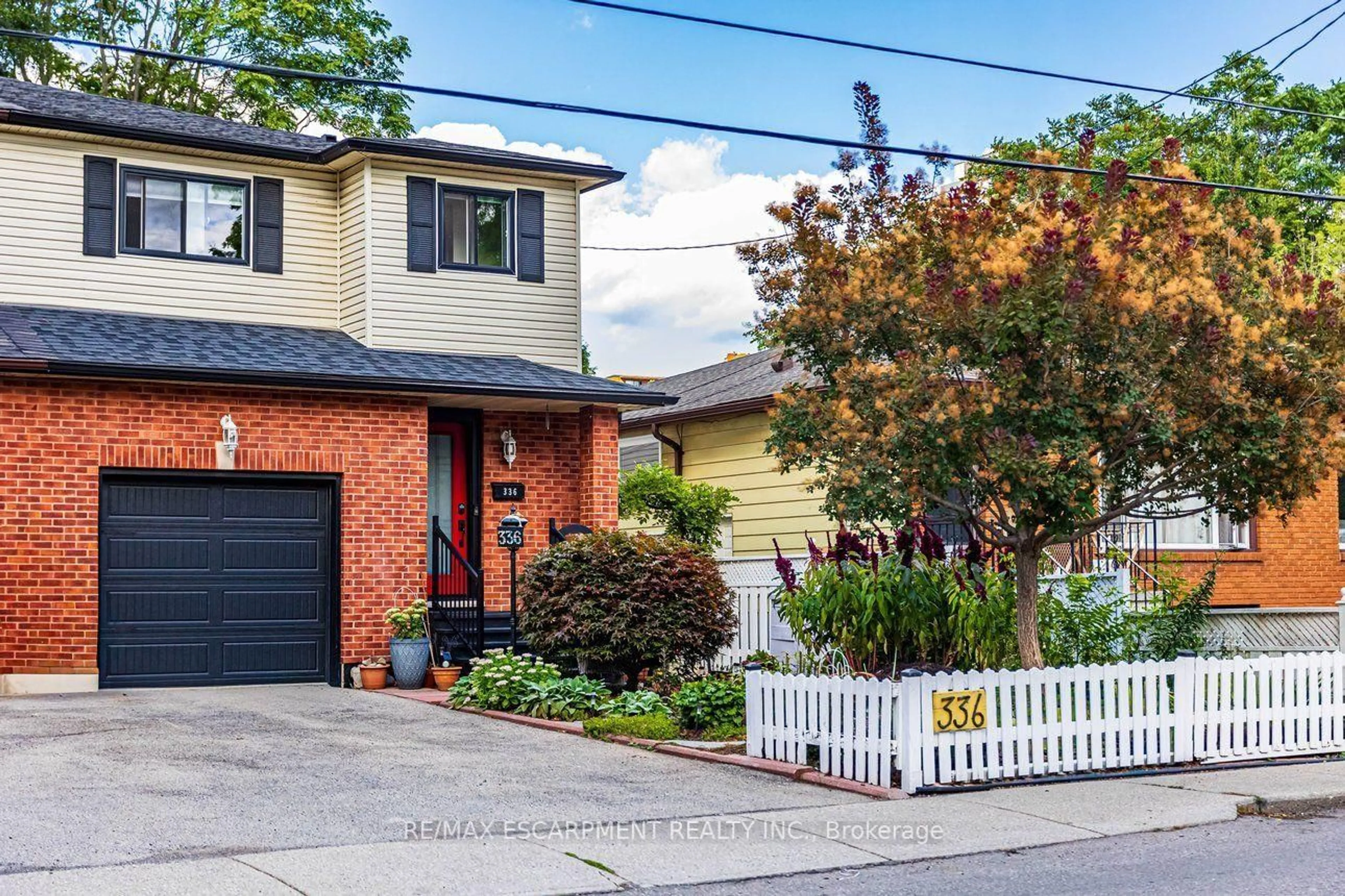 Home with brick exterior material, street for 336 Jackson St, Hamilton Ontario L8P 1M8