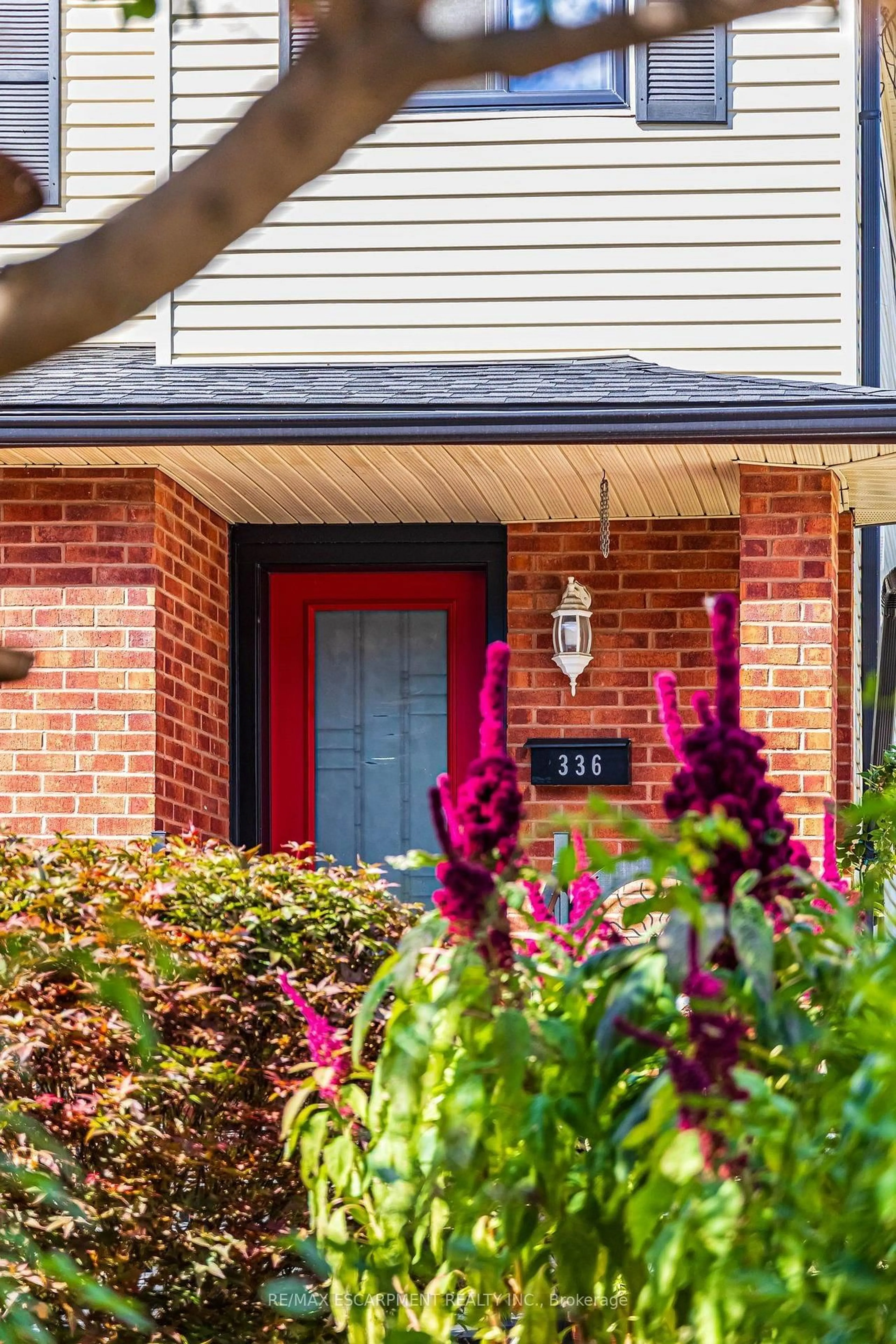 Home with brick exterior material, street for 336 Jackson St, Hamilton Ontario L8P 1M8