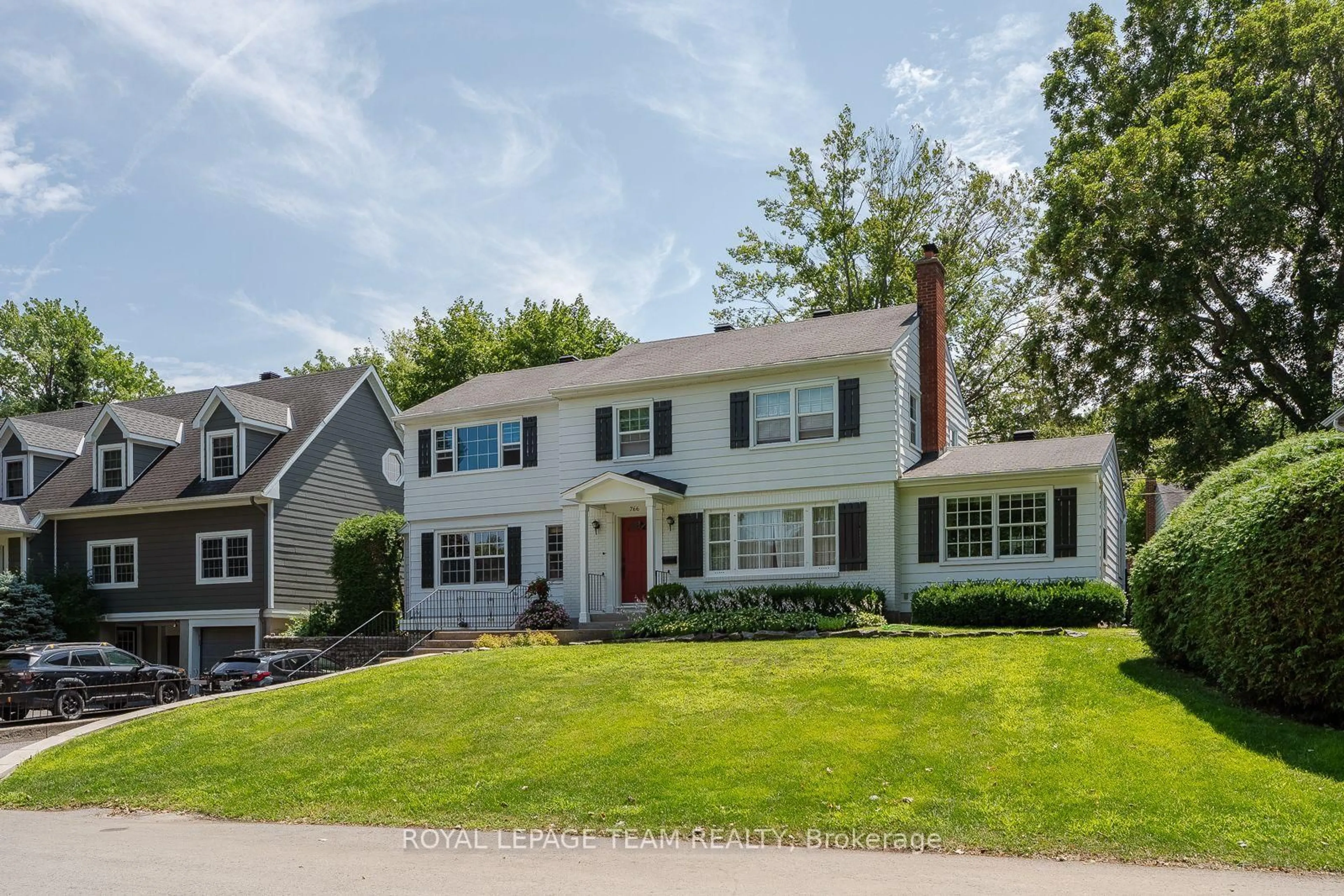 Home with vinyl exterior material, street for 766 Eastbourne Ave, Ottawa Ontario K1K 0H7