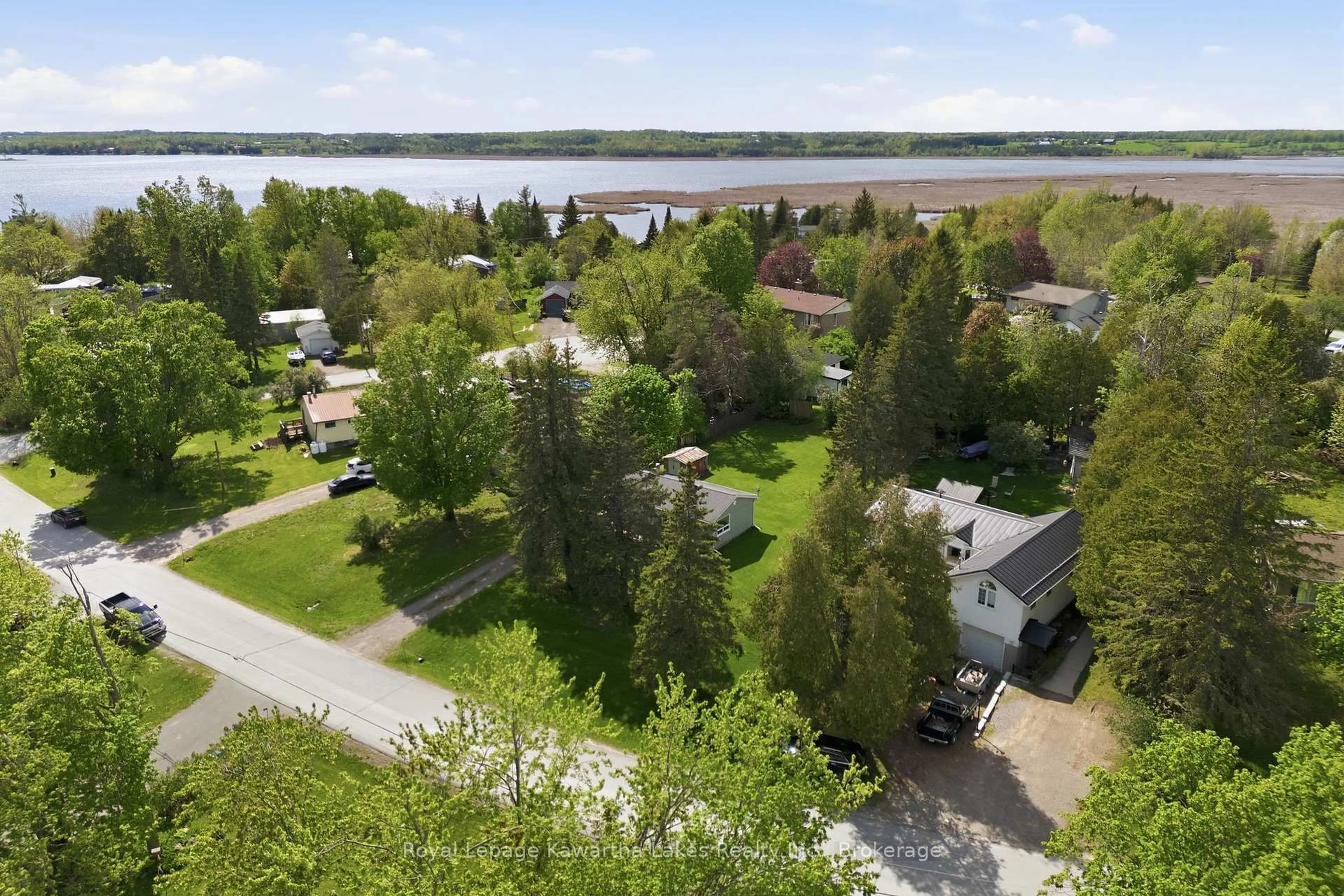 A pic from outside/outdoor area/front of a property/back of a property/a pic from drone, water/lake/river/ocean view for 16 Marilyn Cres, Kawartha Lakes Ontario K0L 1T0