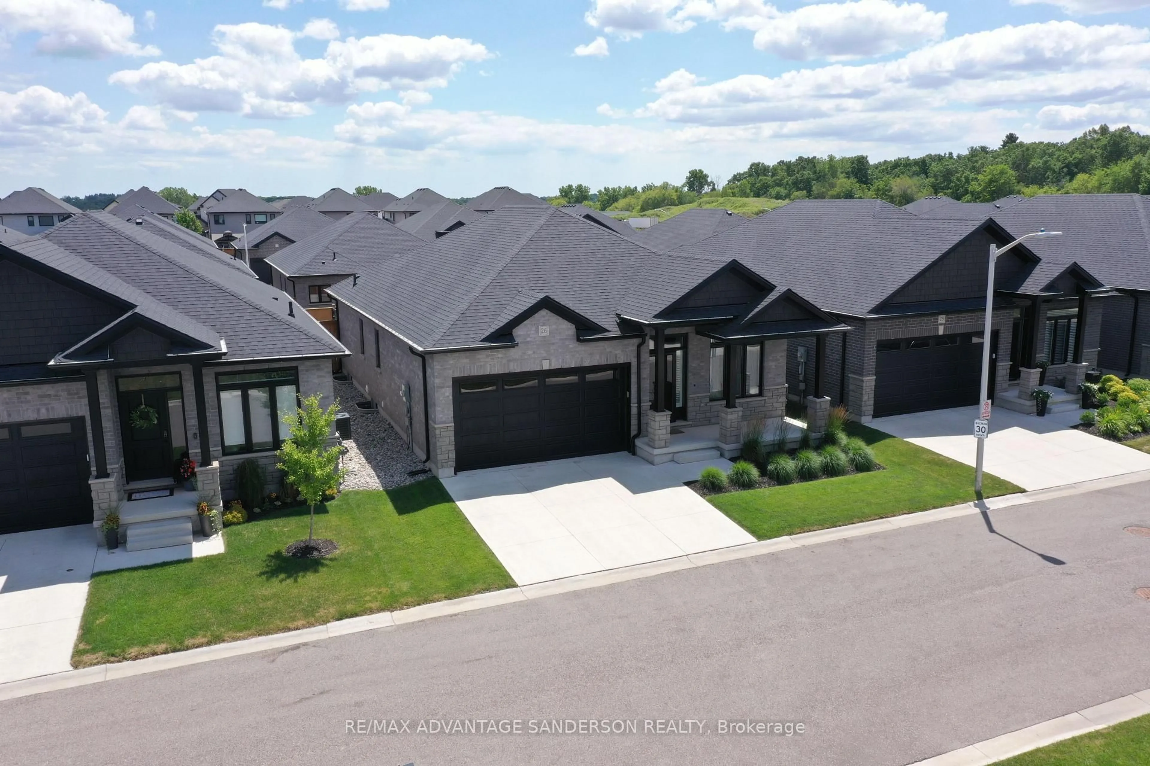 A pic from outside/outdoor area/front of a property/back of a property/a pic from drone, street for 383 Daventry Way #26, Middlesex Centre Ontario N0L 1R0