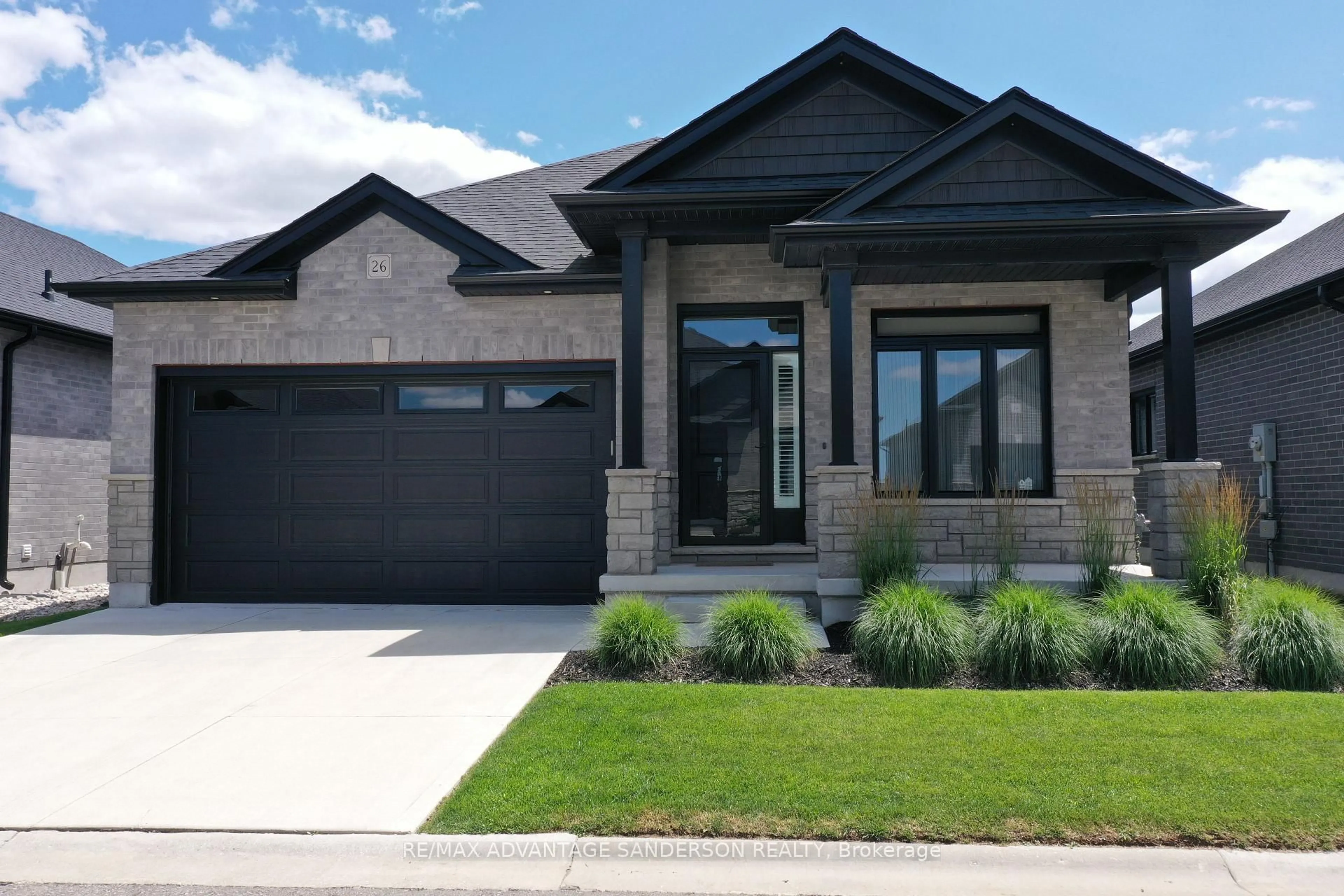 Home with brick exterior material, street for 383 Daventry Way #26, Middlesex Centre Ontario N0L 1R0