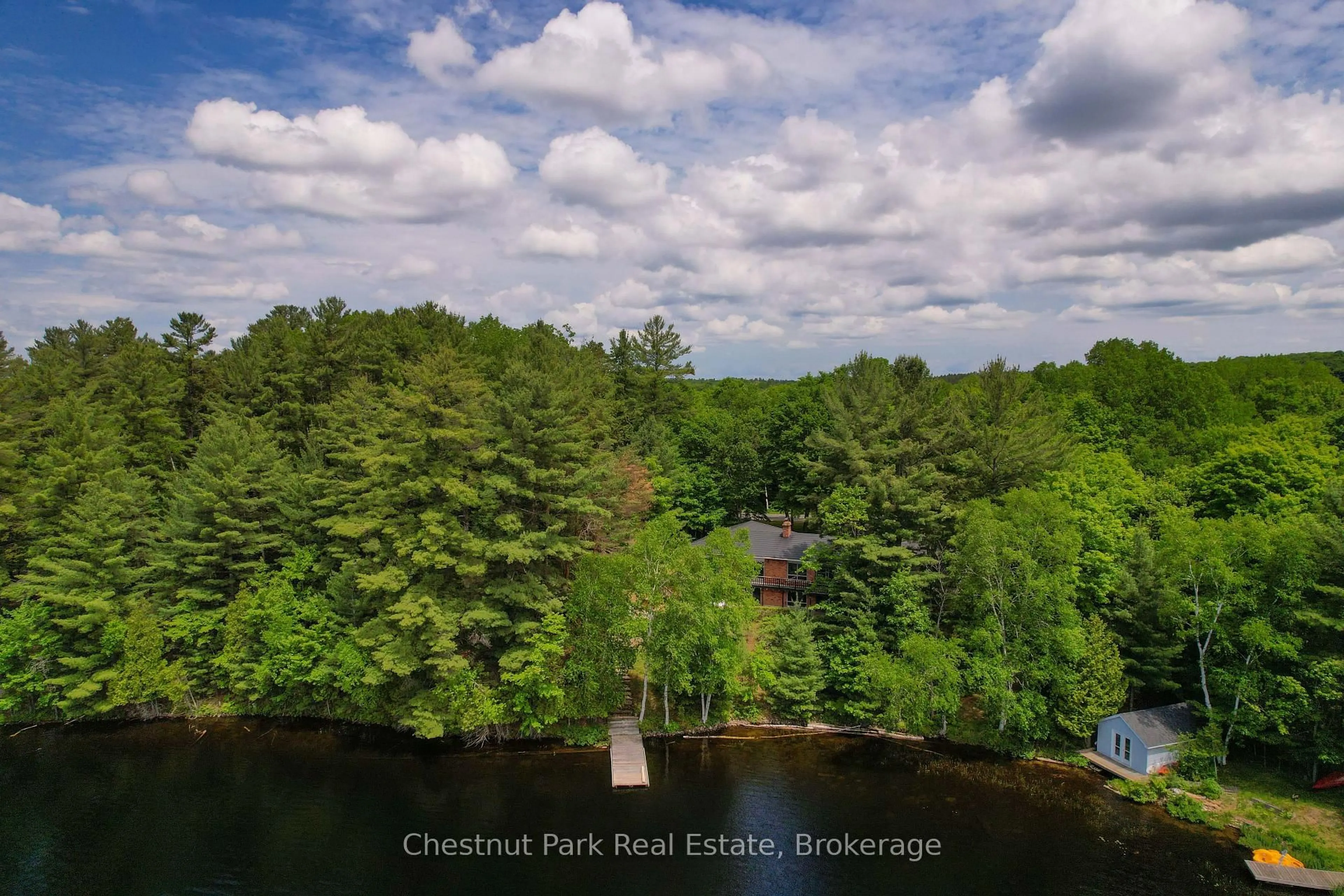 A pic from outside/outdoor area/front of a property/back of a property/a pic from drone, water/lake/river/ocean view for 652 North Waseosa Lake Rd, Huntsville Ontario P1H 2J4