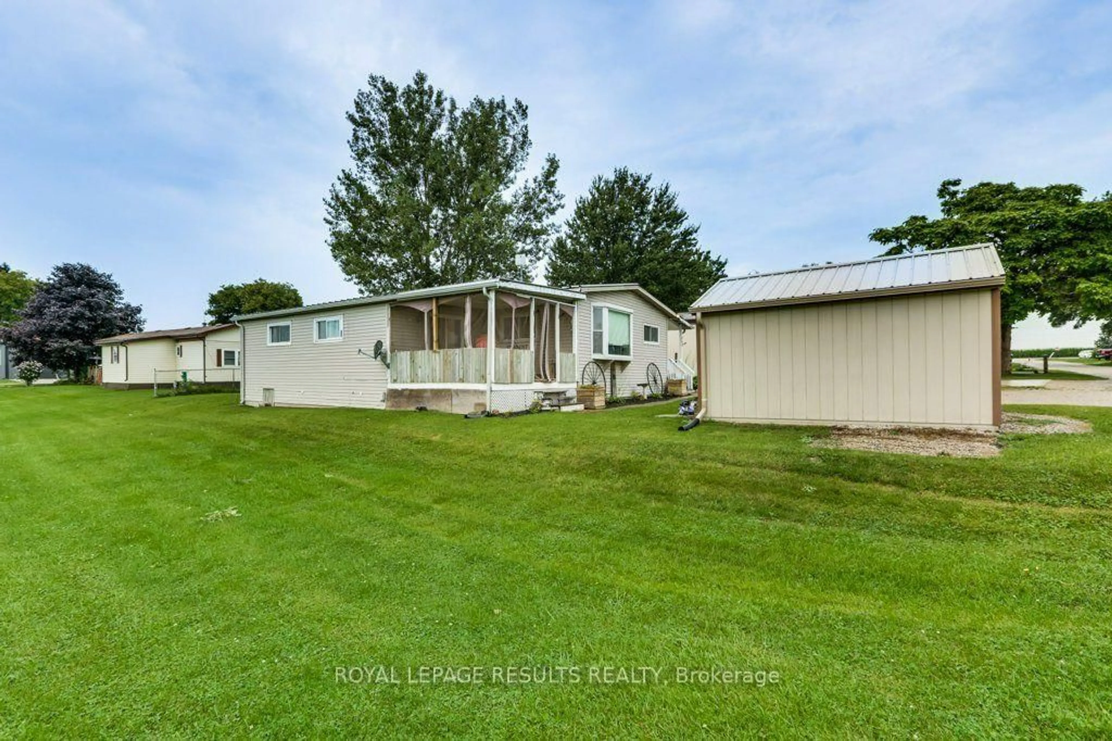 A pic from outside/outdoor area/front of a property/back of a property/a pic from drone, water/lake/river/ocean view for 24 Pineview Ave, Malahide Ontario N0L 2J0