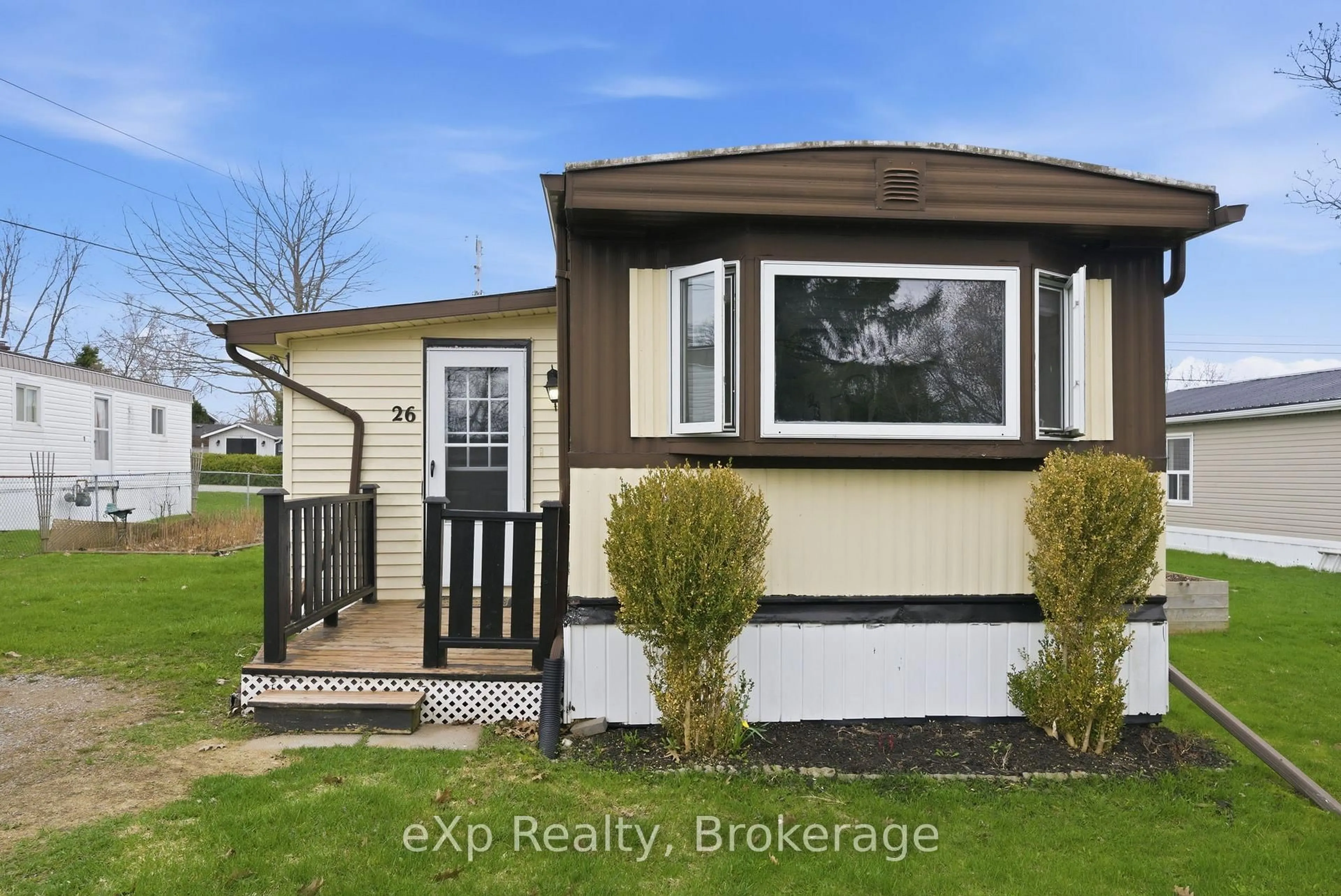 Home with vinyl exterior material, street for 26 Basher Dr, Hamilton Township Ontario K9A 0X9