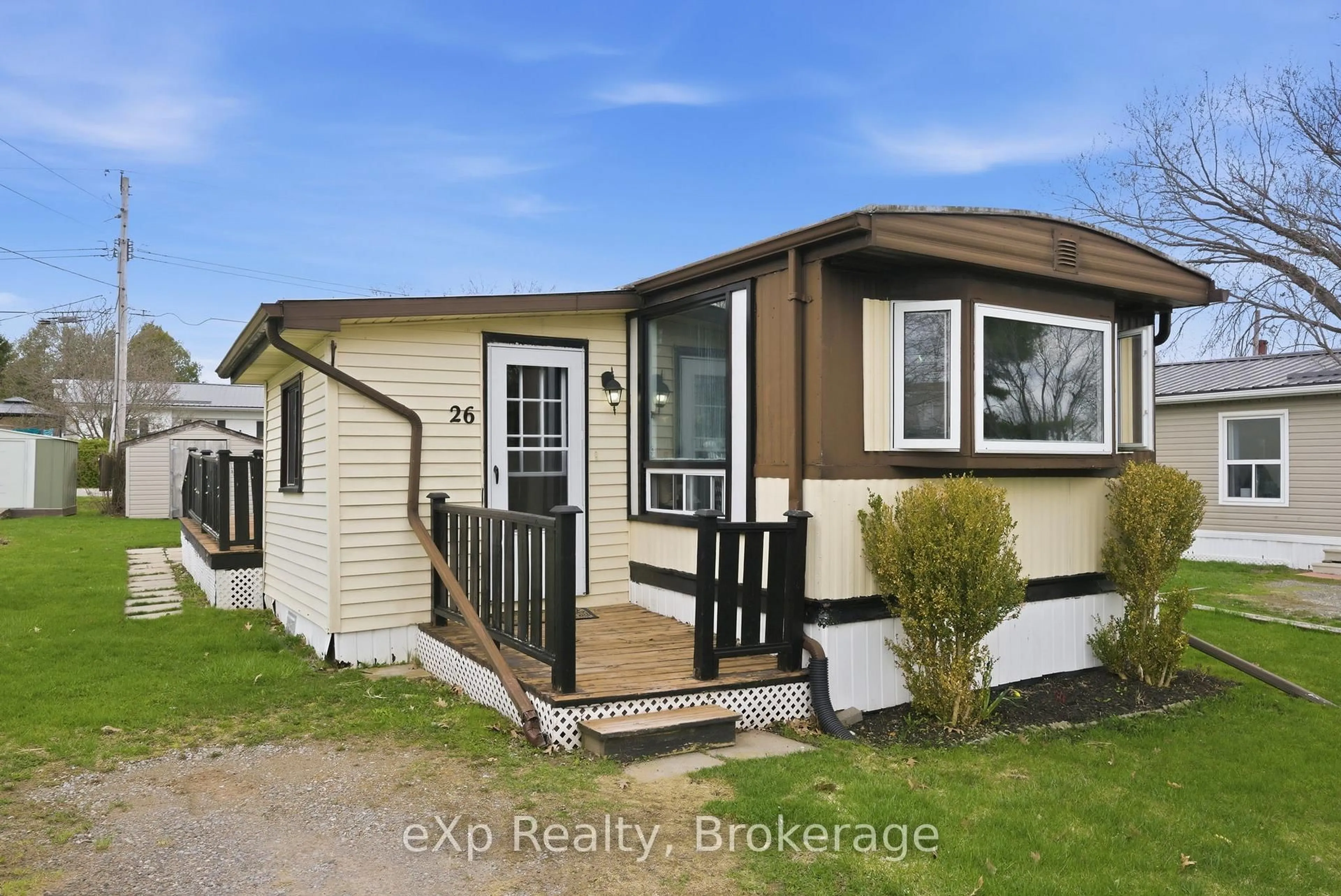 Home with vinyl exterior material, street for 26 Basher Dr, Hamilton Township Ontario K9A 0X9