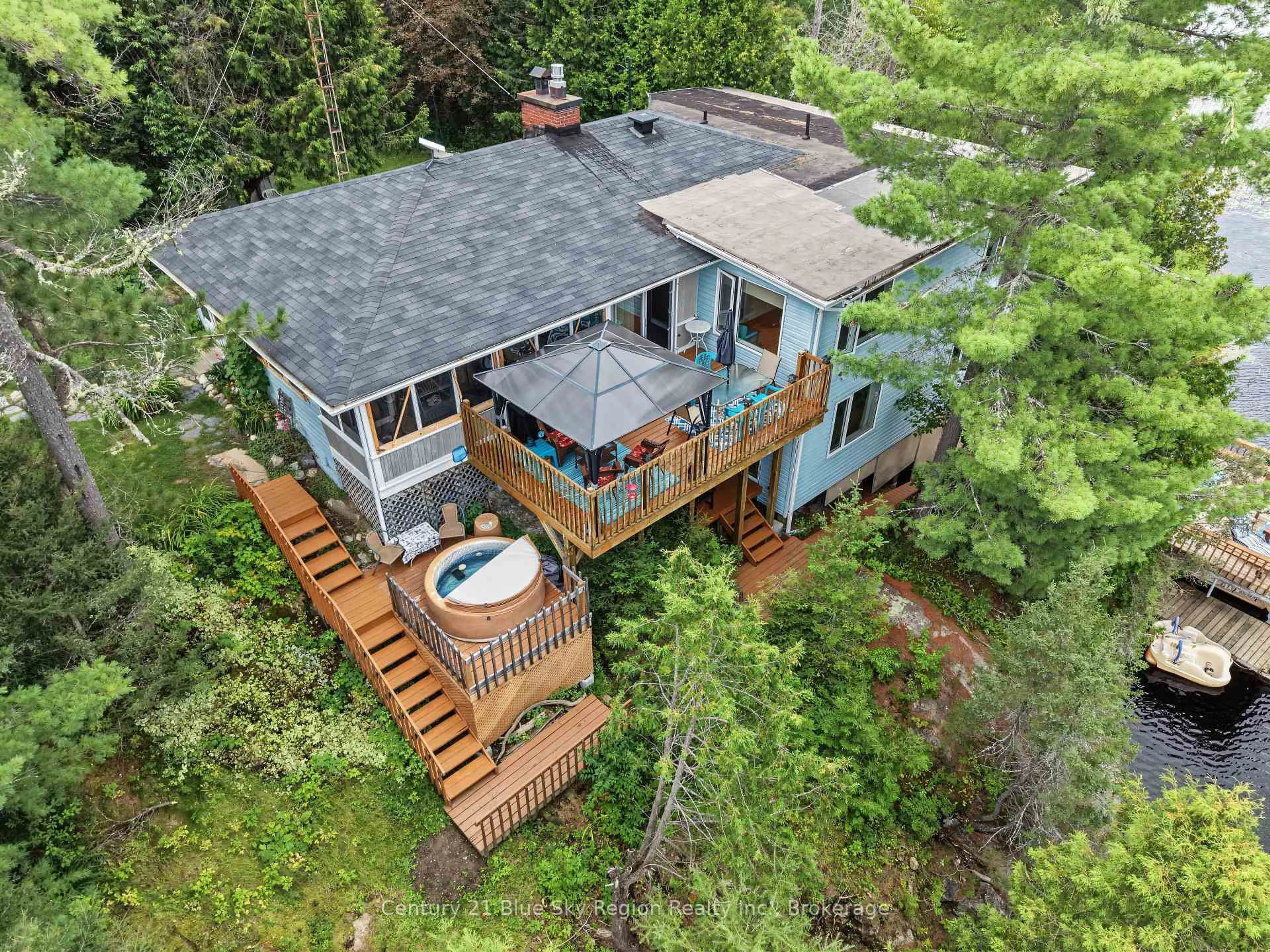 A pic from outside/outdoor area/front of a property/back of a property/a pic from drone, water/lake/river/ocean view for 5065 Highway 11, Temagami Ontario P1B 8G3