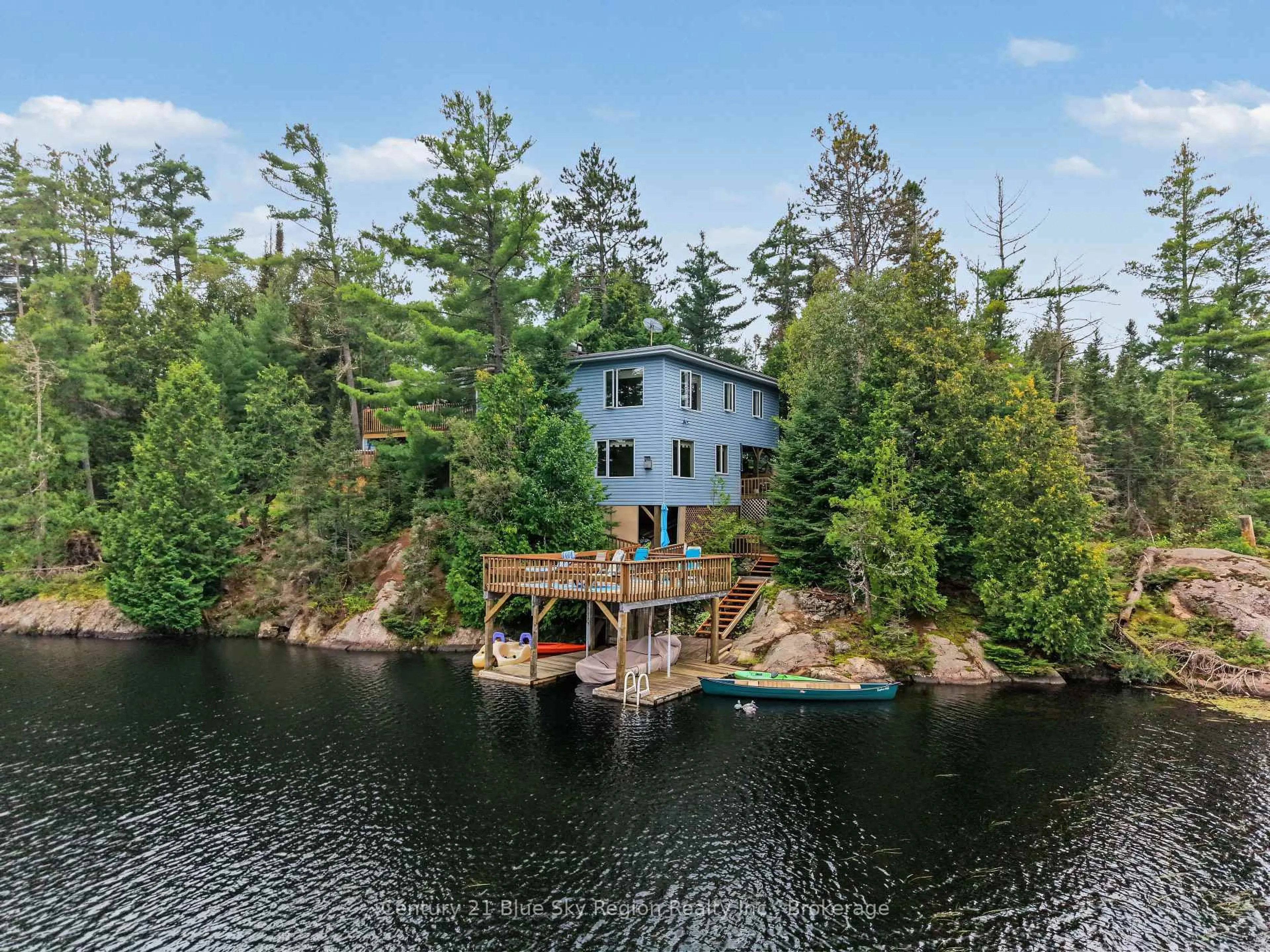 A pic from outside/outdoor area/front of a property/back of a property/a pic from drone, water/lake/river/ocean view for 5065 Highway 11, Temagami Ontario P1B 8G3