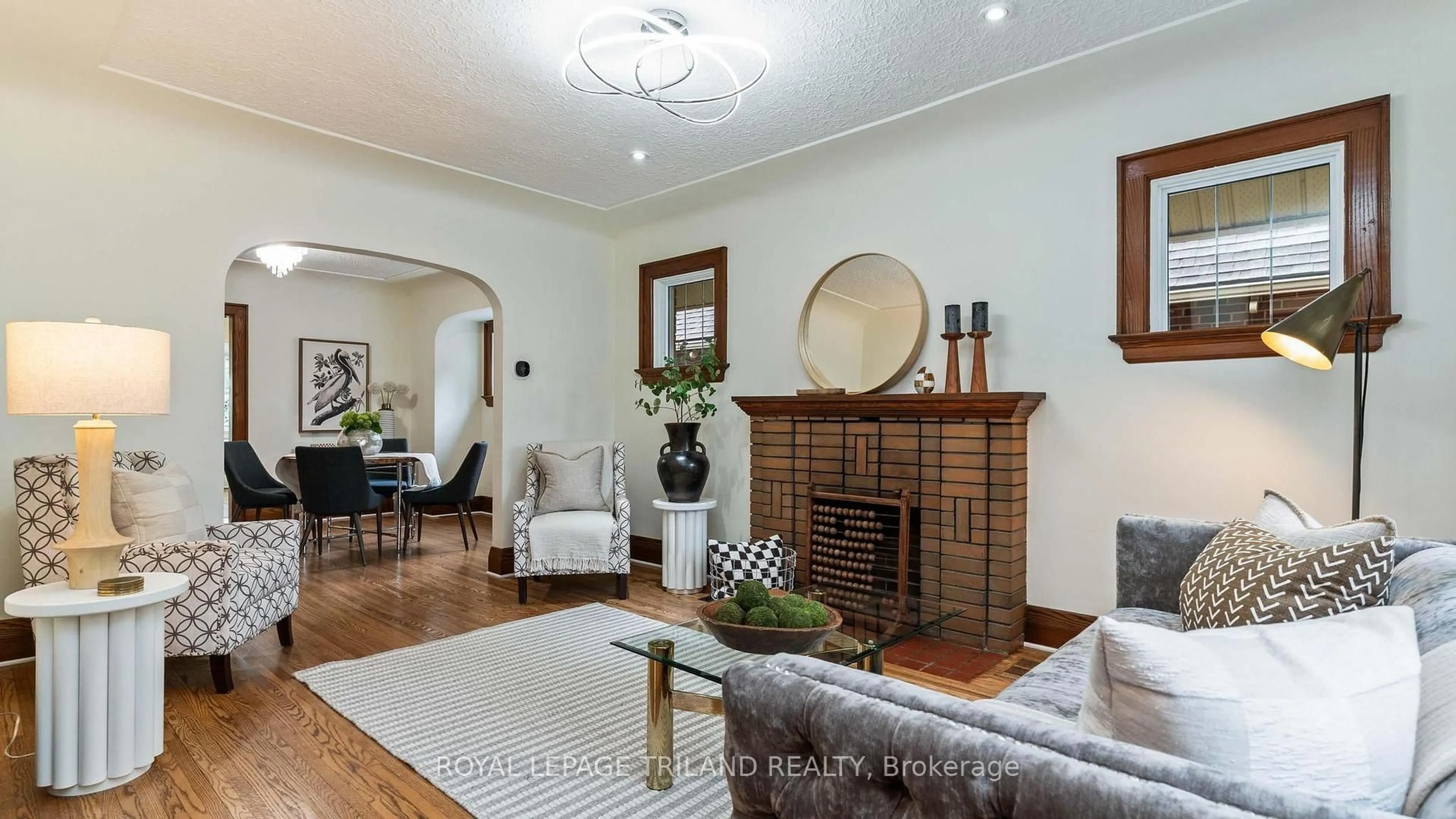 Living room with furniture, wood/laminate floor for 282 Cathcart St, London South Ontario N6C 3N5