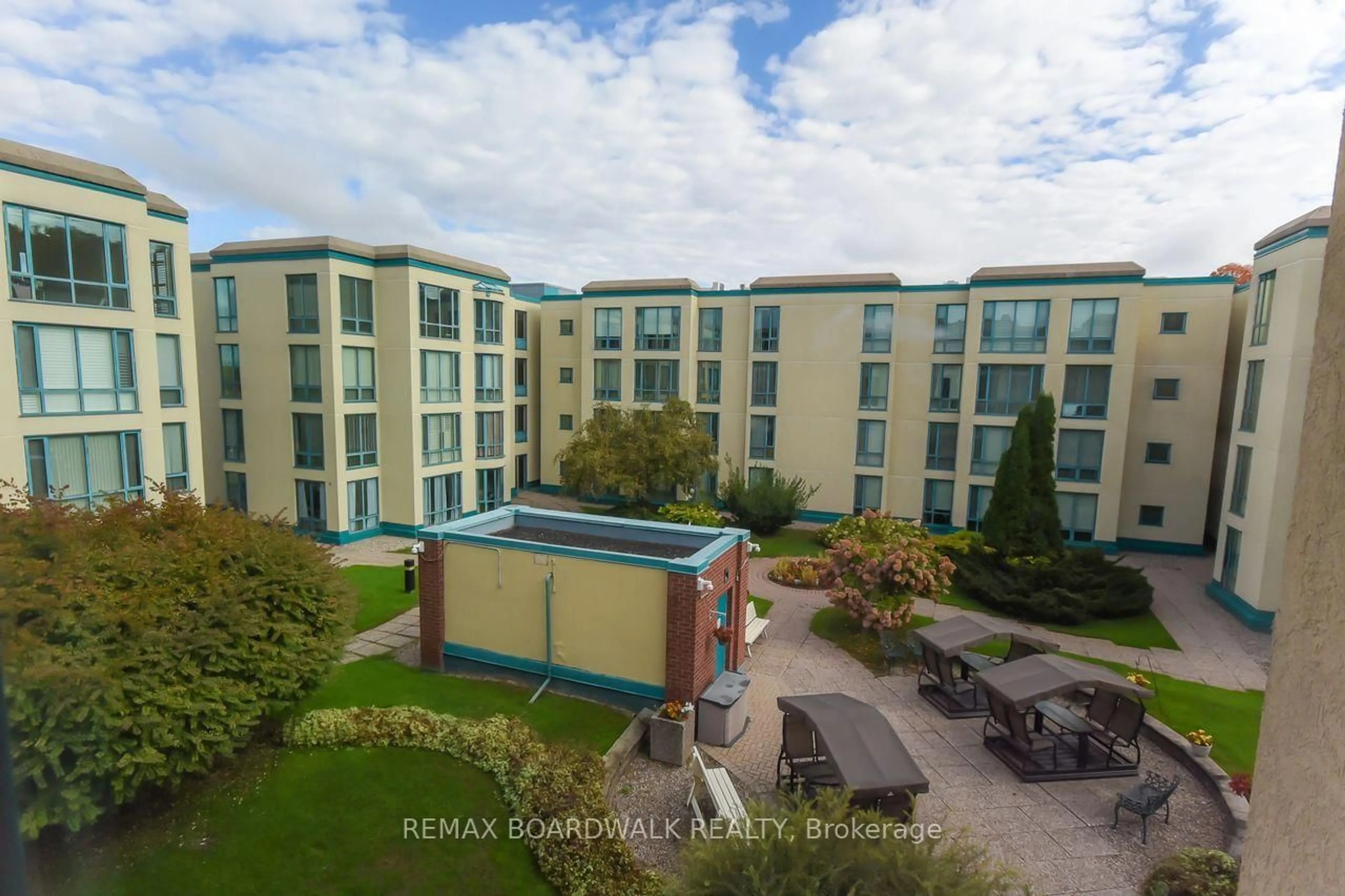 A pic from outside/outdoor area/front of a property/back of a property/a pic from drone, unknown for 330 Centrum Blvd #206, Ottawa Ontario K1E 3W2