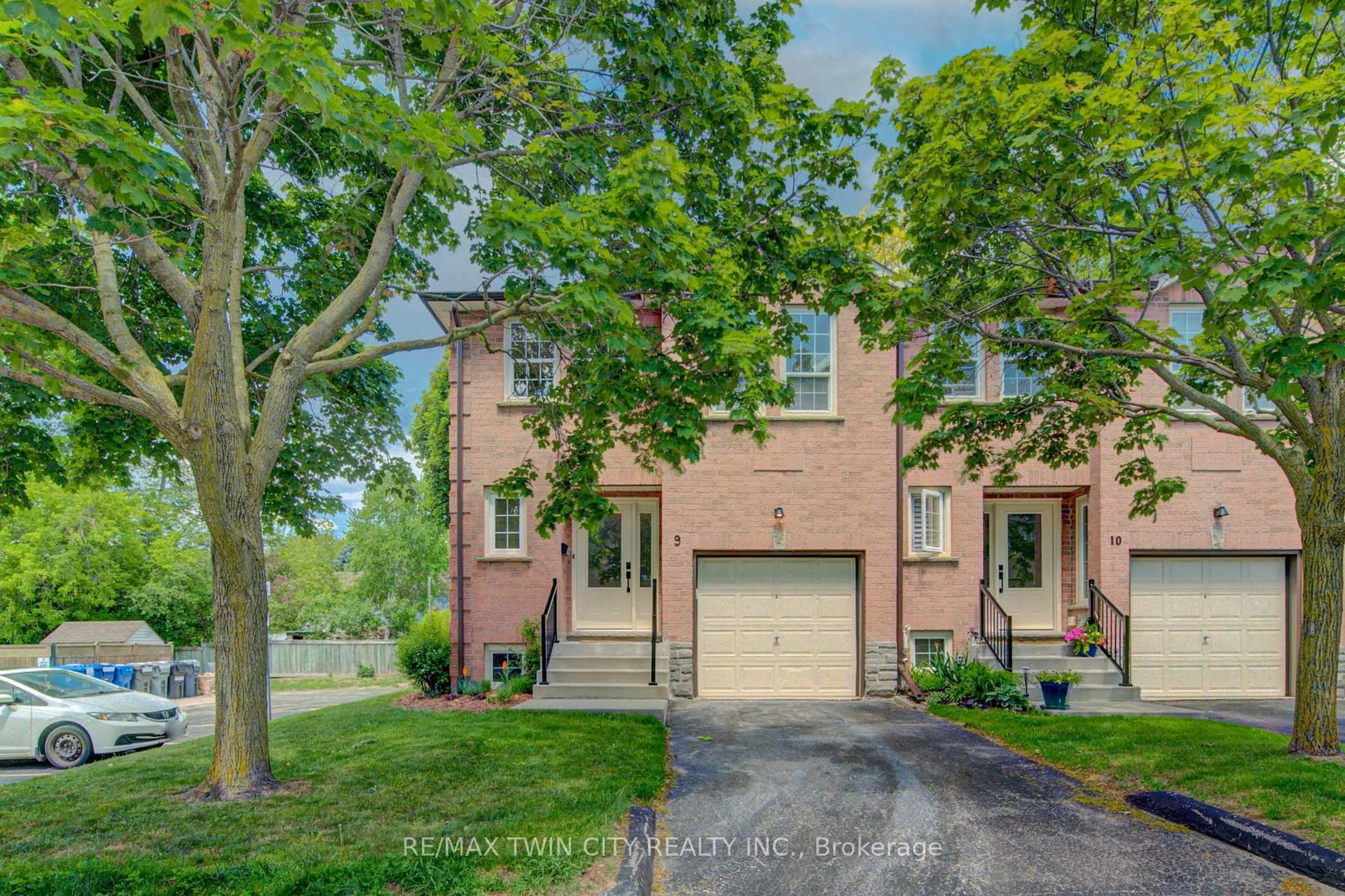 Home with brick exterior material, street for 375 Holiday Inn Dr #9, Cambridge Ontario N3C 3P6
