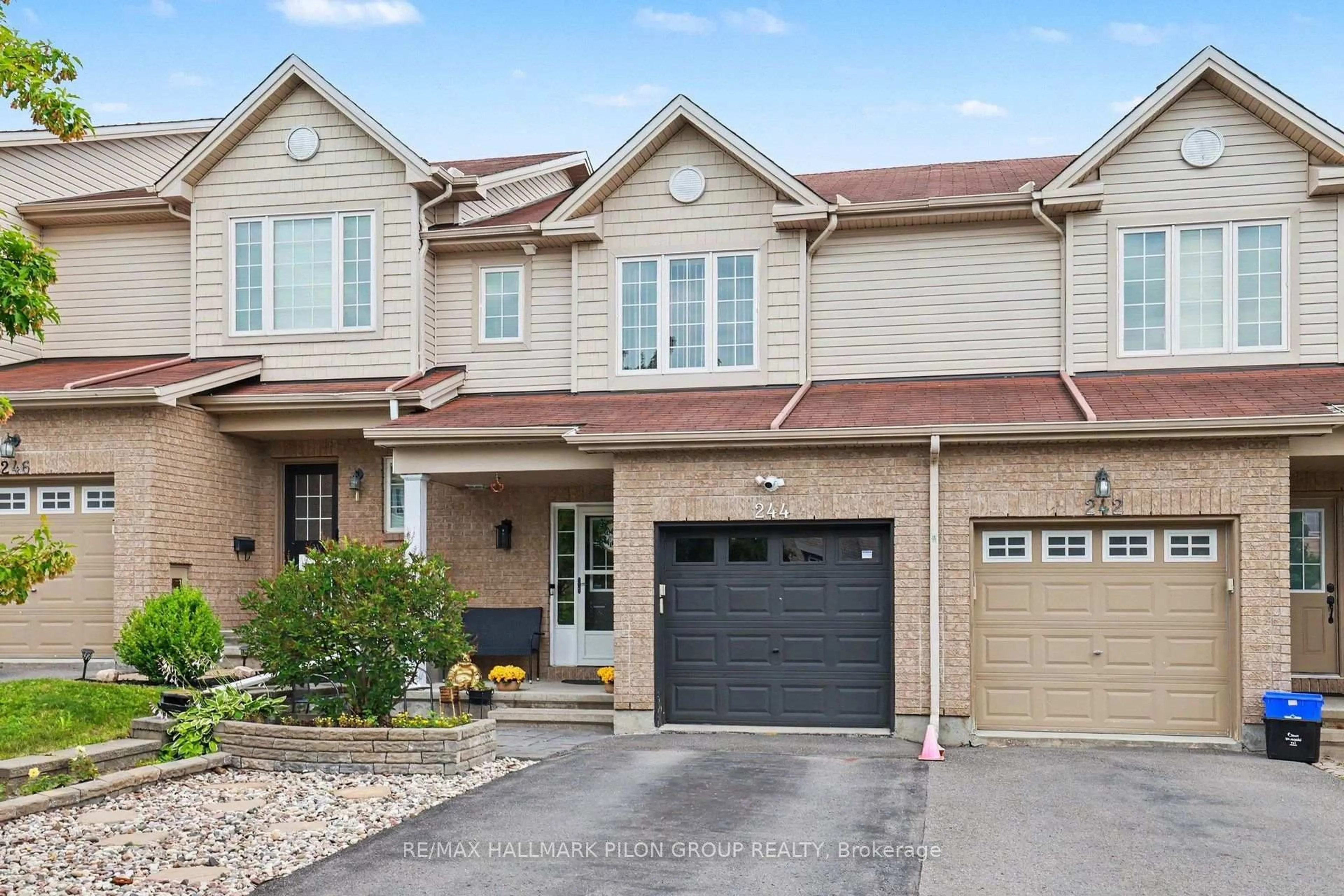 Home with brick exterior material, street for 244 Rolling Meadow Cres, Ottawa Ontario K1W 0A8
