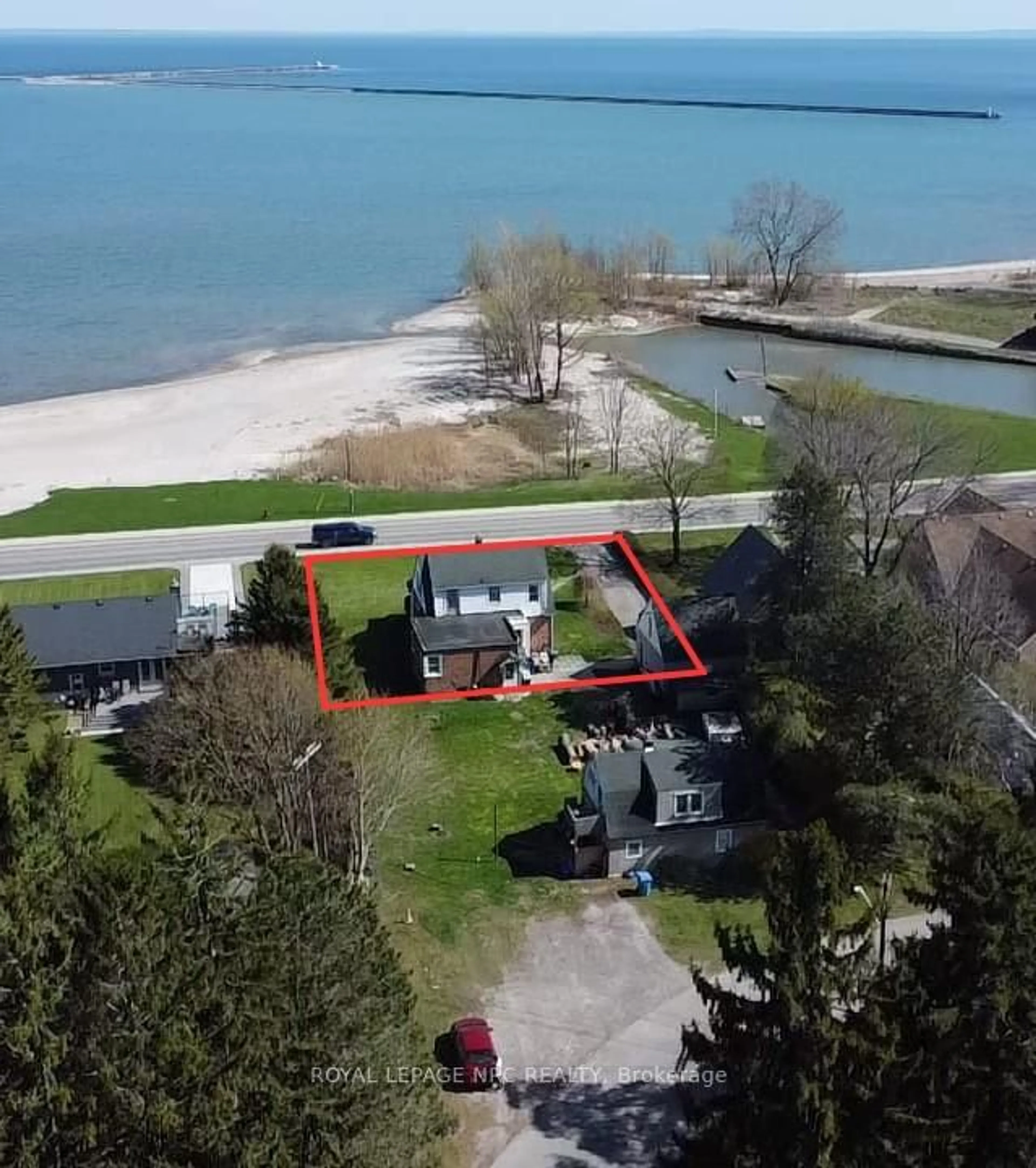 A pic from outside/outdoor area/front of a property/back of a property/a pic from drone, water/lake/river/ocean view for 19 Lakeshore Rd, Port Colborne Ontario L3K 2S2
