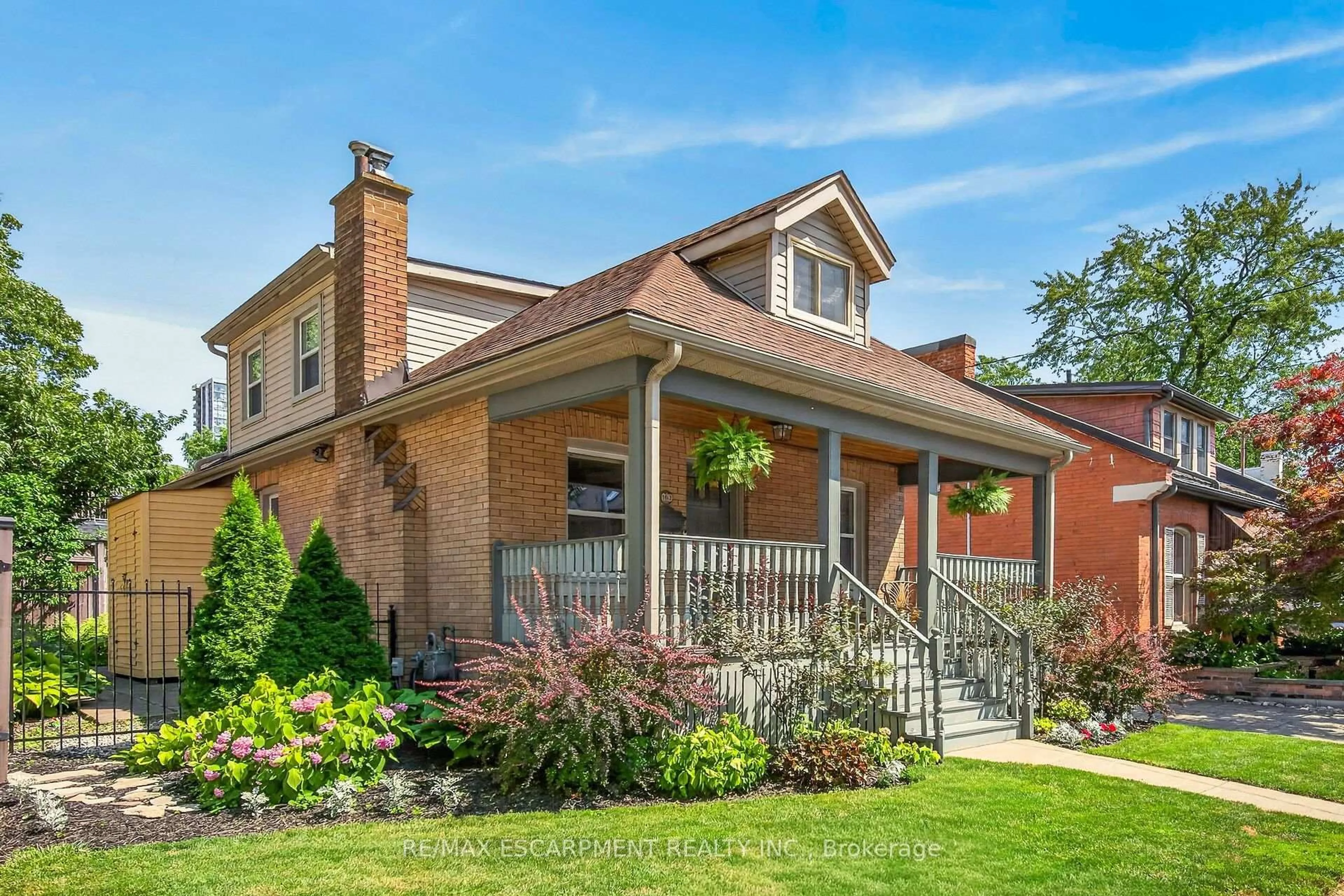 Home with brick exterior material, street for 163 HESS St, Hamilton Ontario L8P 3N8