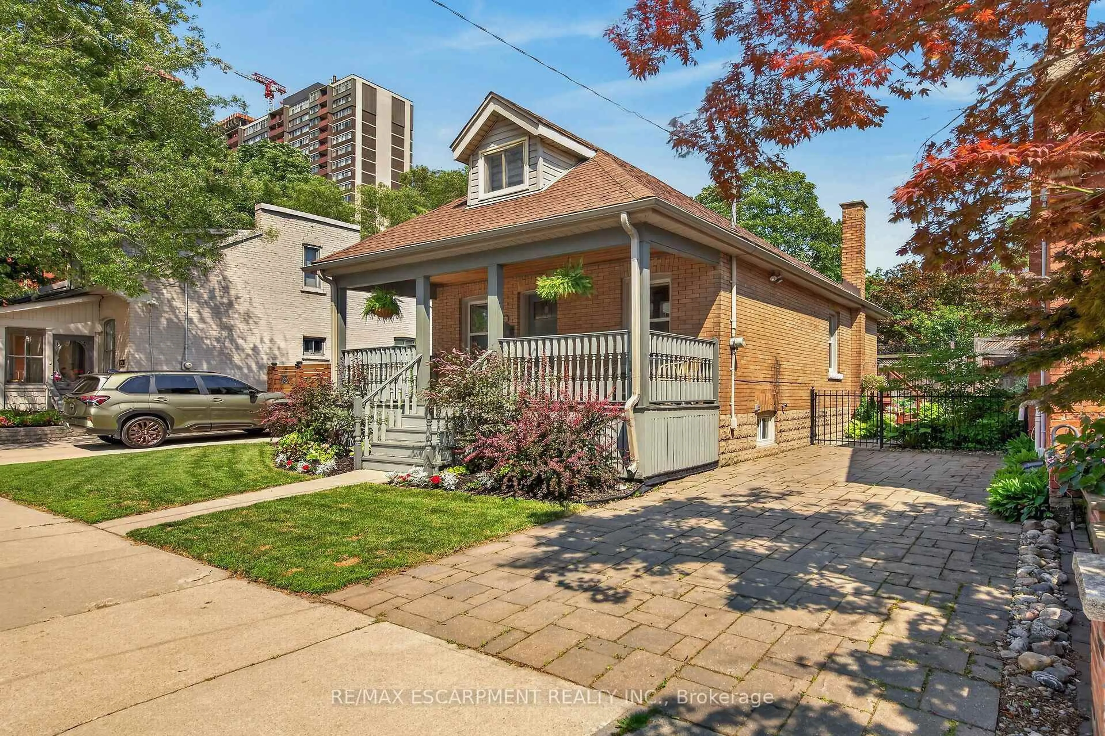 Home with brick exterior material, street for 163 HESS St, Hamilton Ontario L8P 3N8