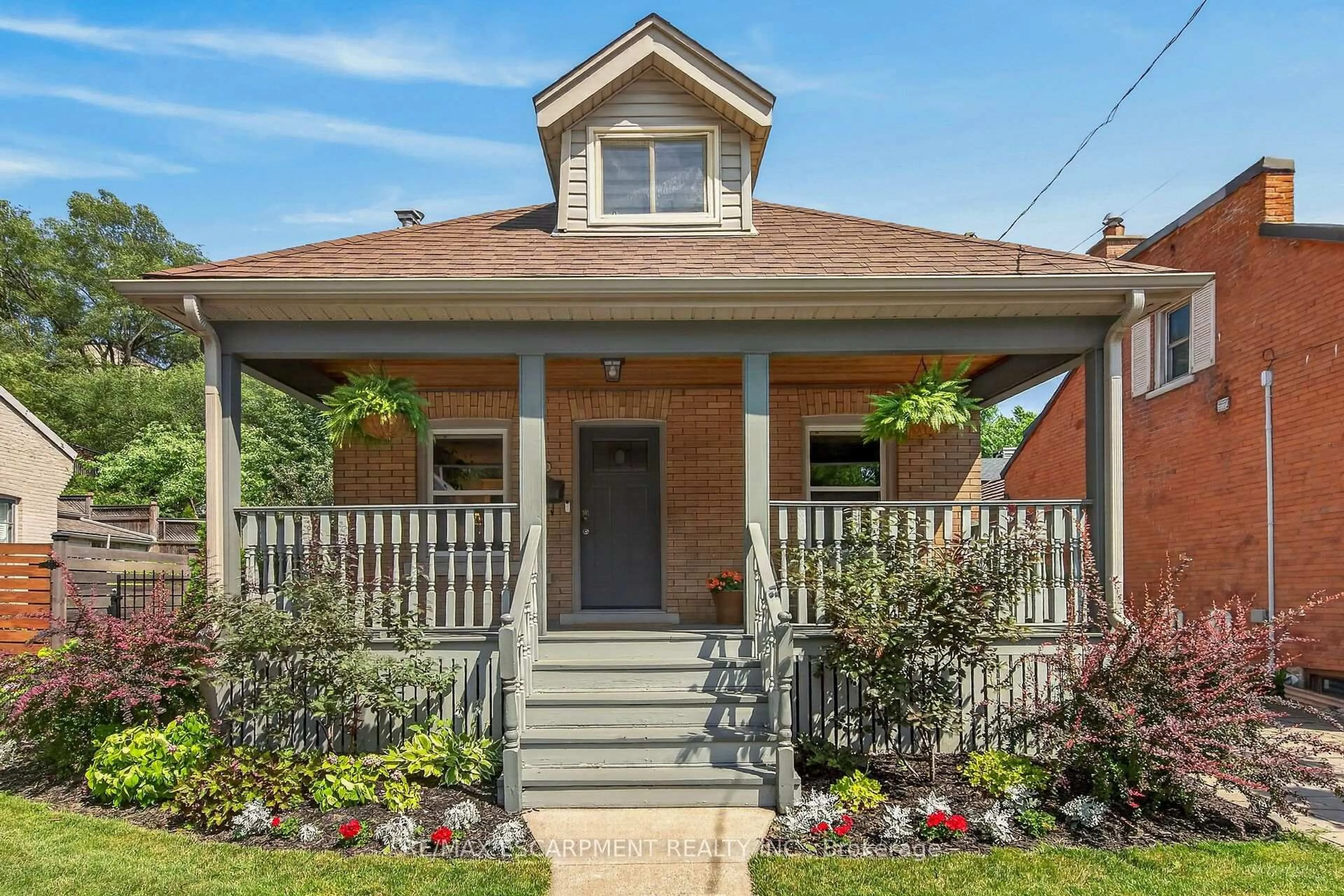 Home with brick exterior material, street for 163 HESS St, Hamilton Ontario L8P 3N8
