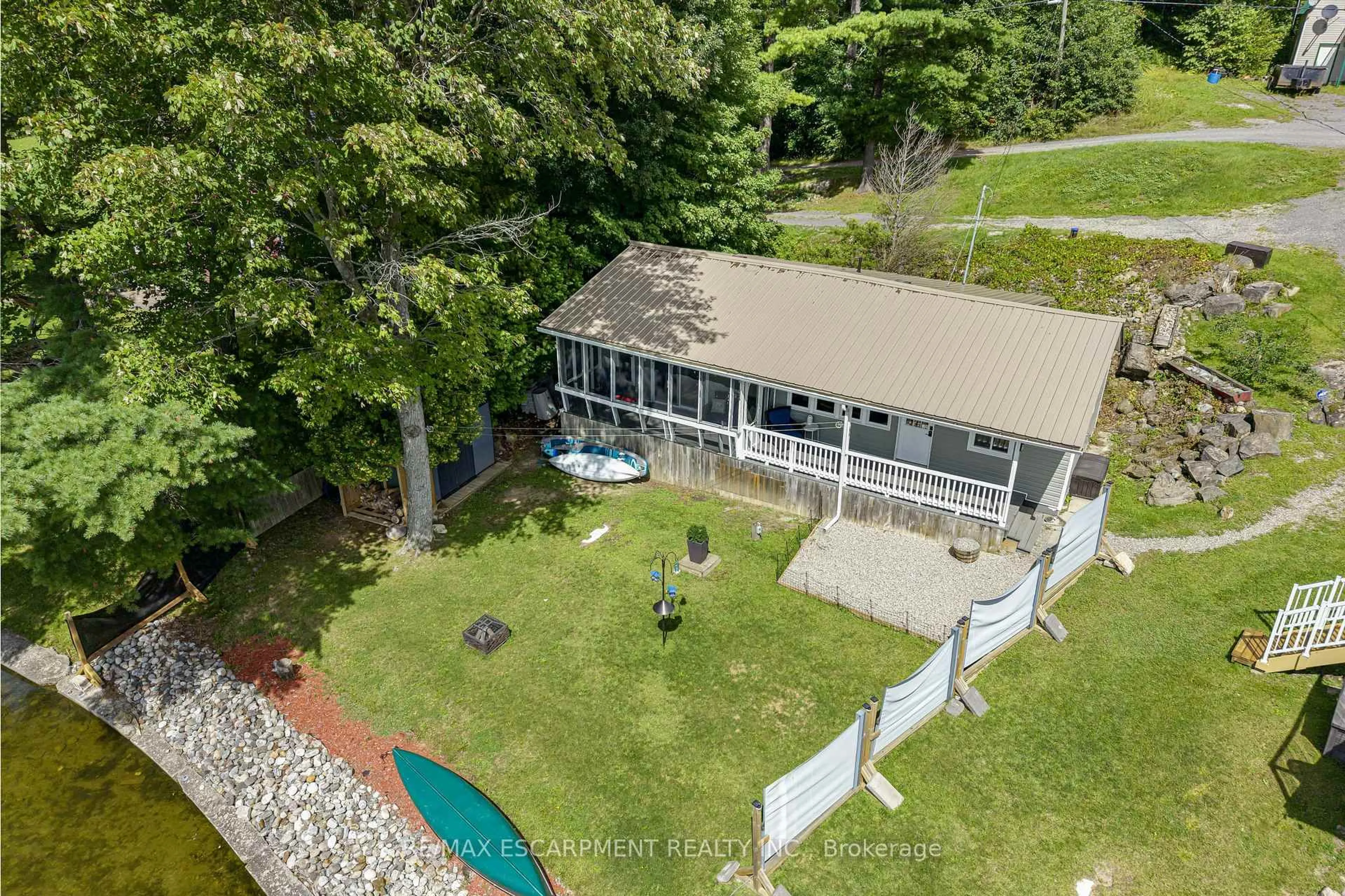 A pic from outside/outdoor area/front of a property/back of a property/a pic from drone, water/lake/river/ocean view for 805 Cartwrights Lane, Leeds and the Thousand Islands Ontario K0H 2N0