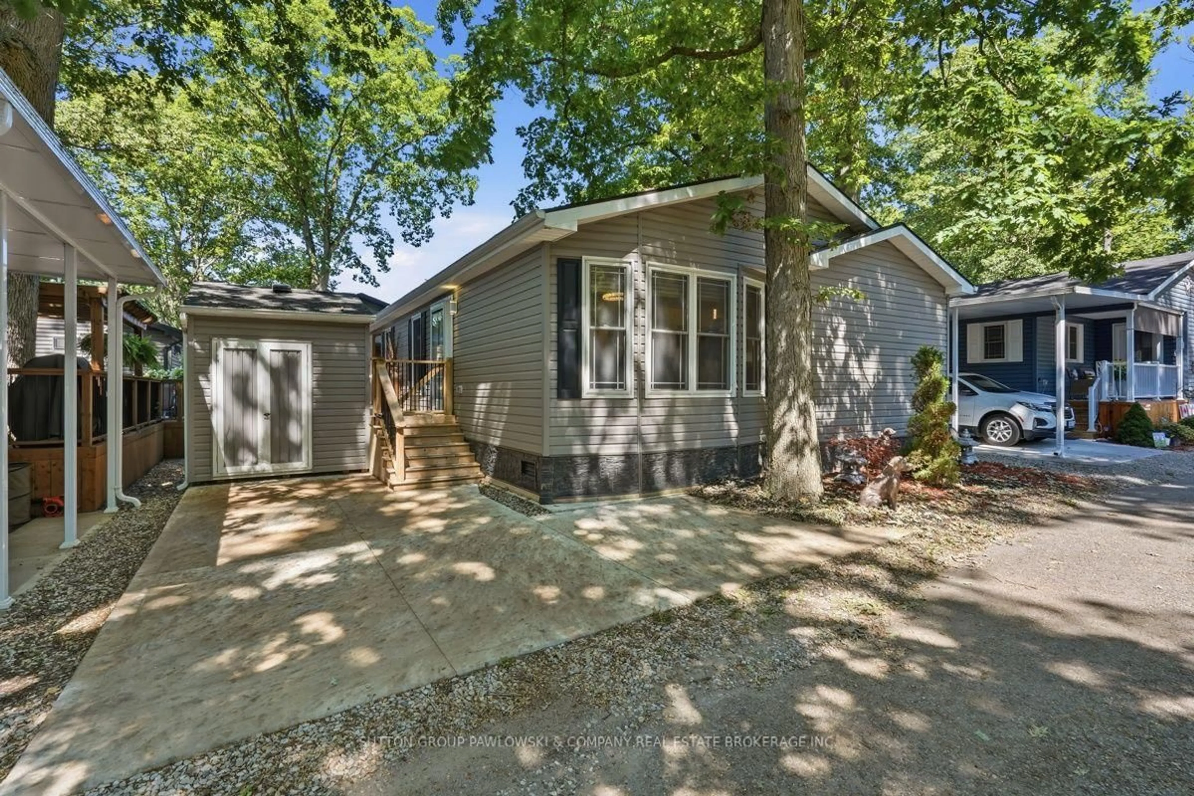 Home with vinyl exterior material, street for 22790 Amiens Rd #56, Middlesex Centre Ontario N0L 1R0