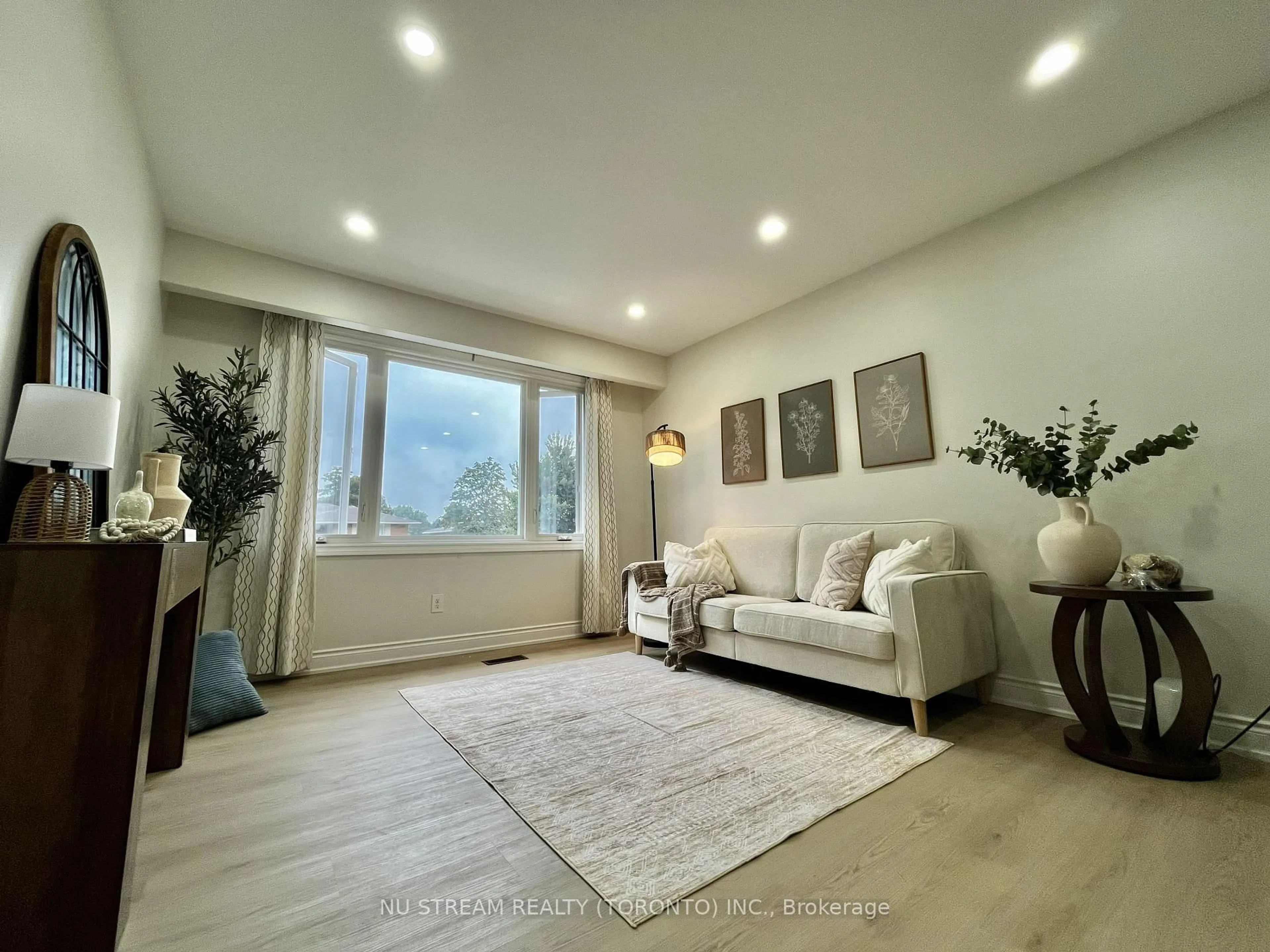 Living room with furniture, wood/laminate floor for 297 Toll Gate Blvd, Waterloo Ontario N2L 4M5
