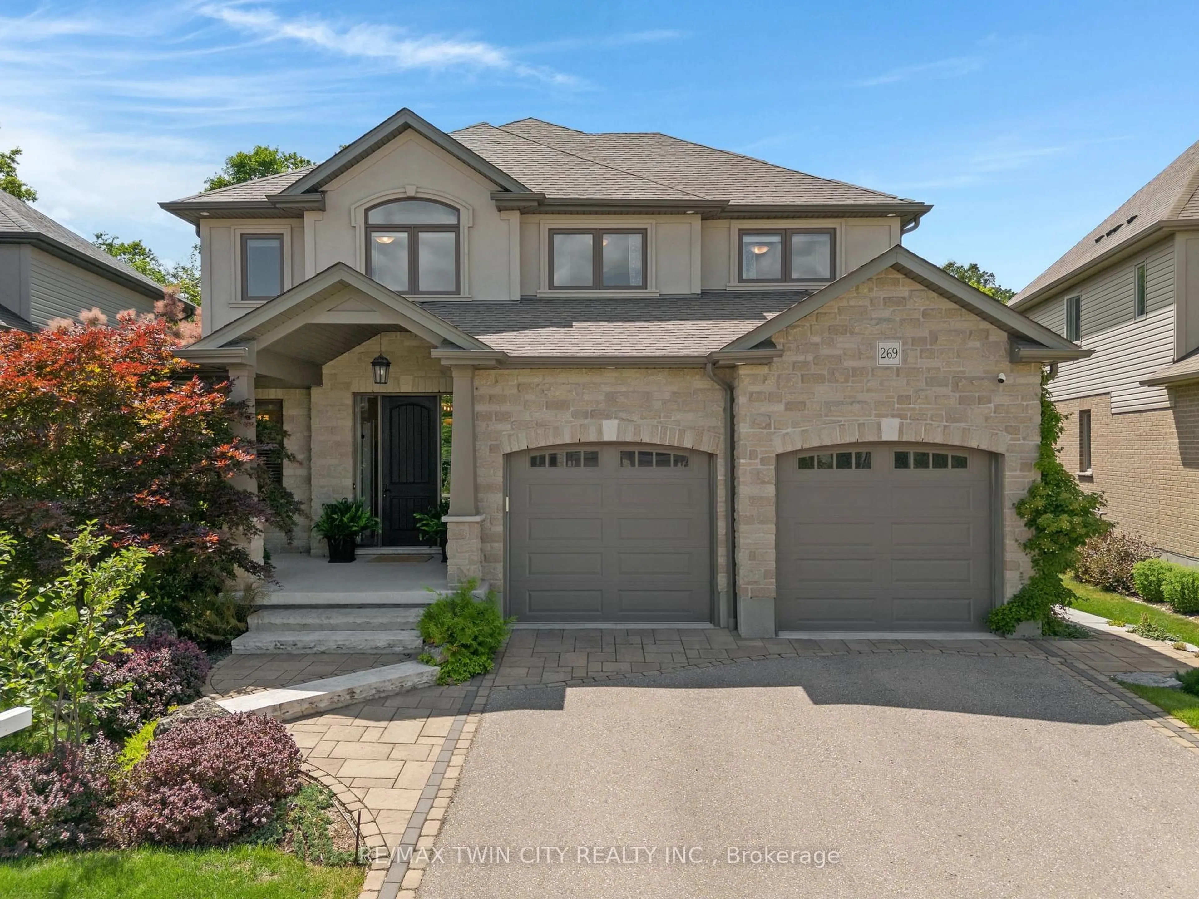 Home with brick exterior material, street for 269 Carriage Way, Waterloo Ontario N2K 1S7